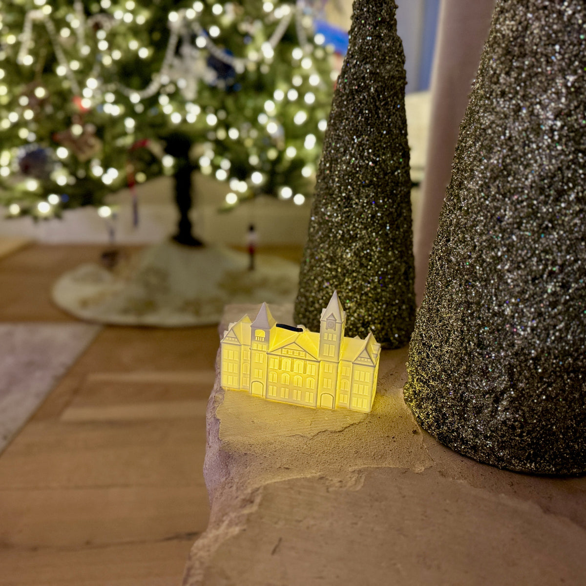 Auburn University ornament shown in a home decorated for Christmas.