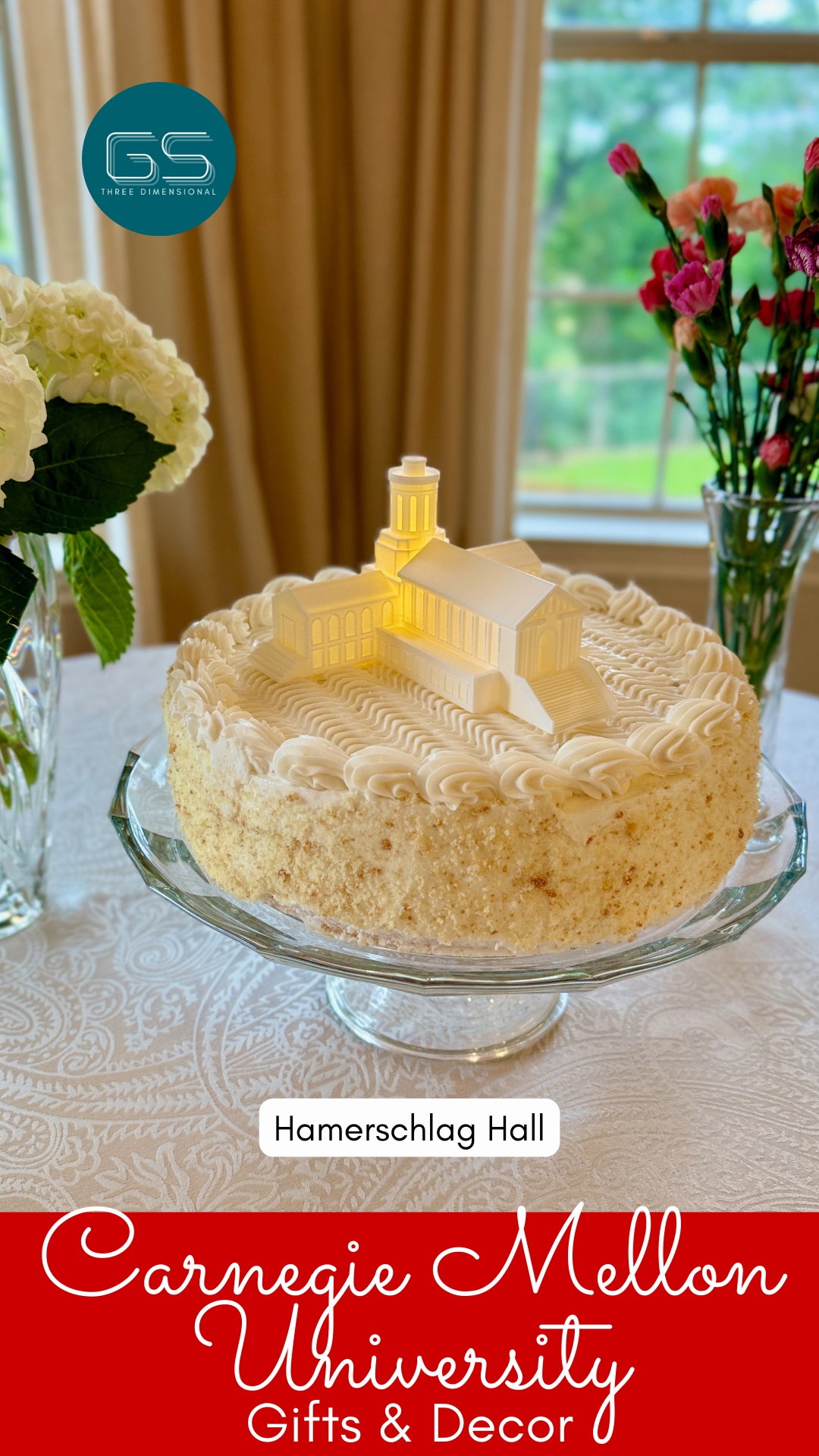 The Carnegie Mellon cake topper light, designed as a replica of the Hamerschlag Hall building.