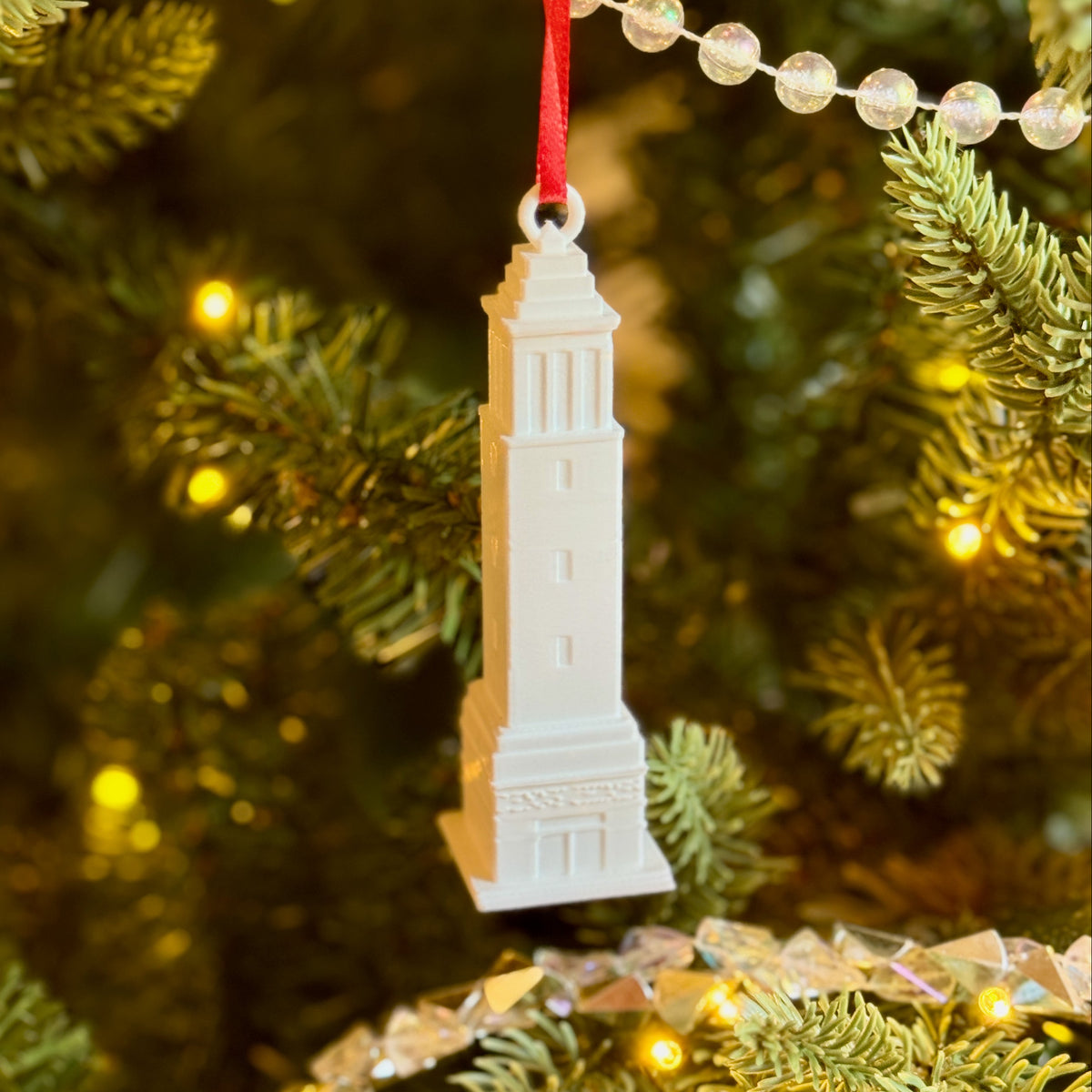 Denny Chimes ornament for Bama fans, shown on a Christmas tree.