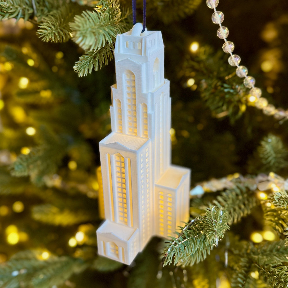 LED-lit 3D printed ornament of the University of Pittsburgh Cathedral of Learning.