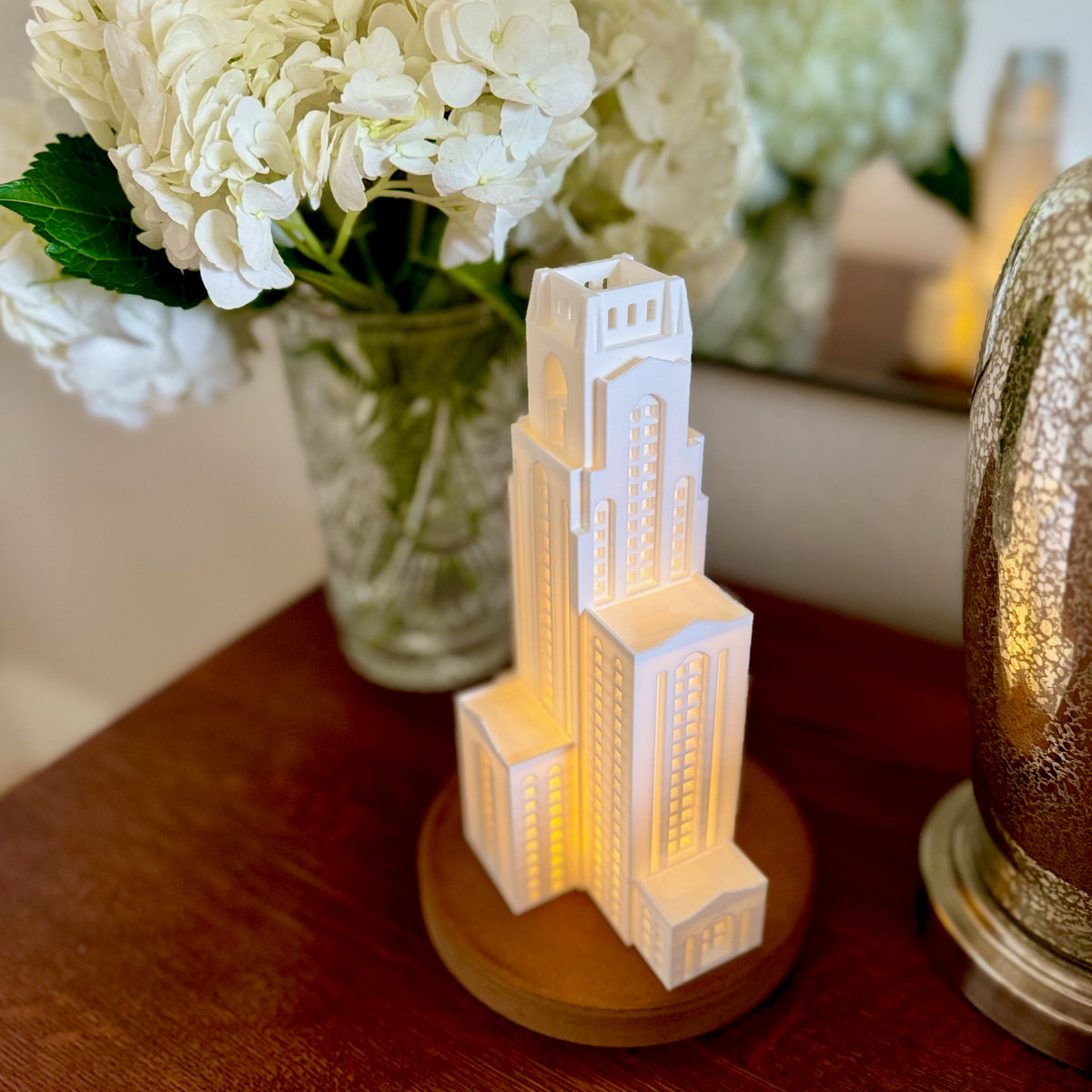 The University of Pittsburgh dorm decoration, a lamp that looks like the Pitt Cathy.