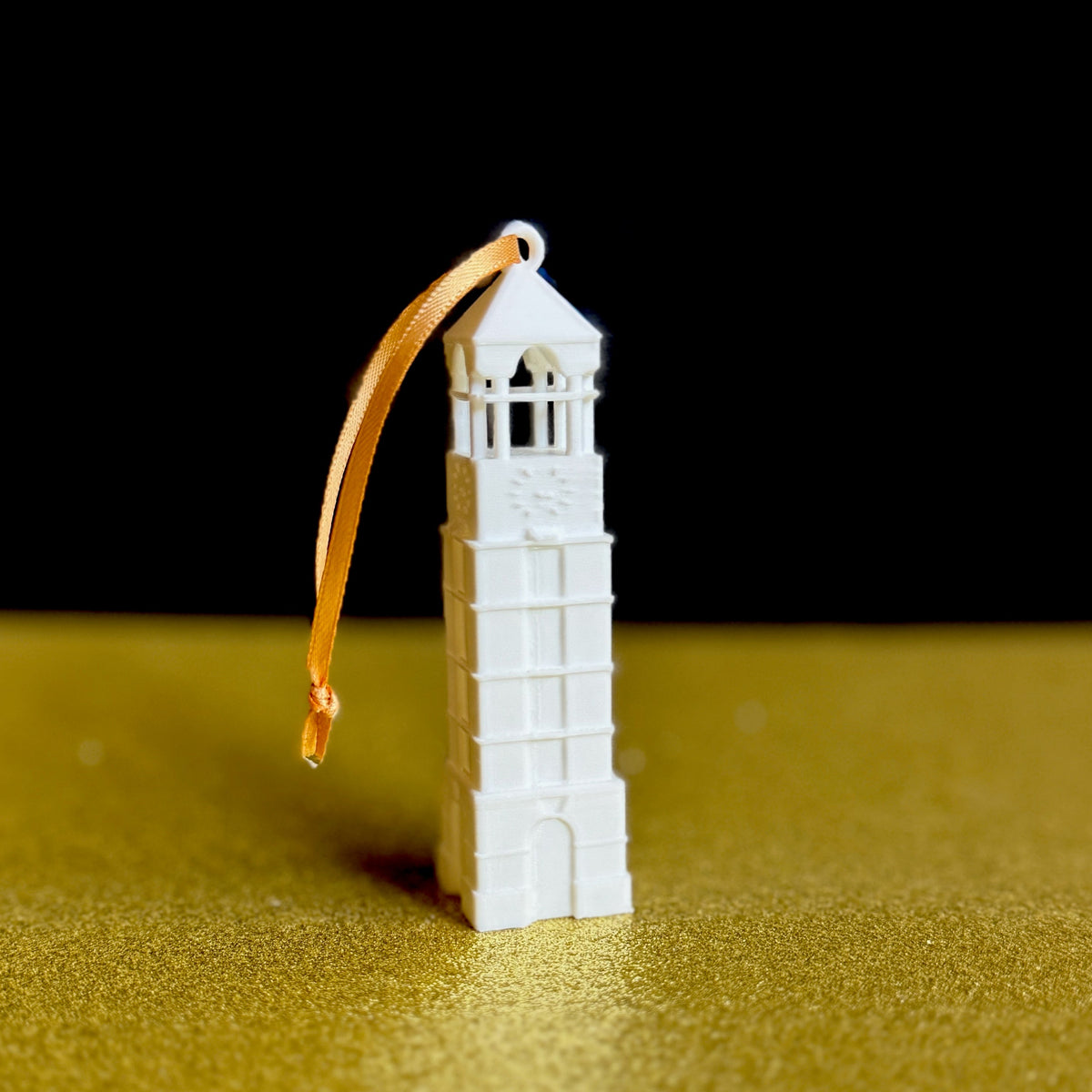 The Purdue University Christmas ornament, designed as a replica of the bell tower on campus.