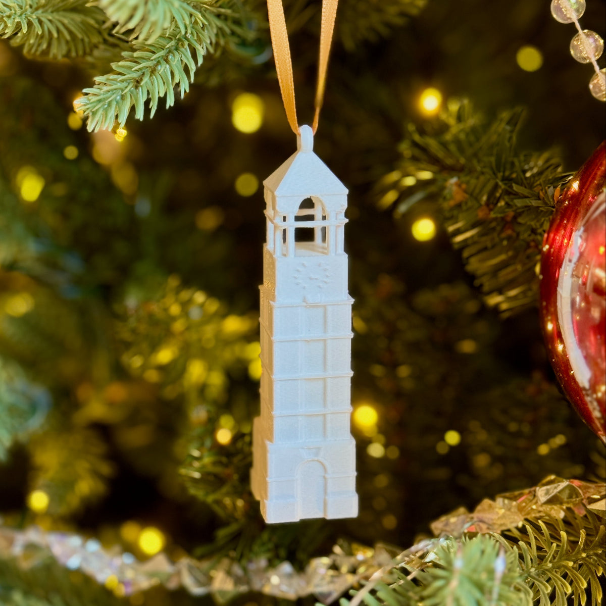 The Purdue bell tower ornament shown on a Boilermakers tree.