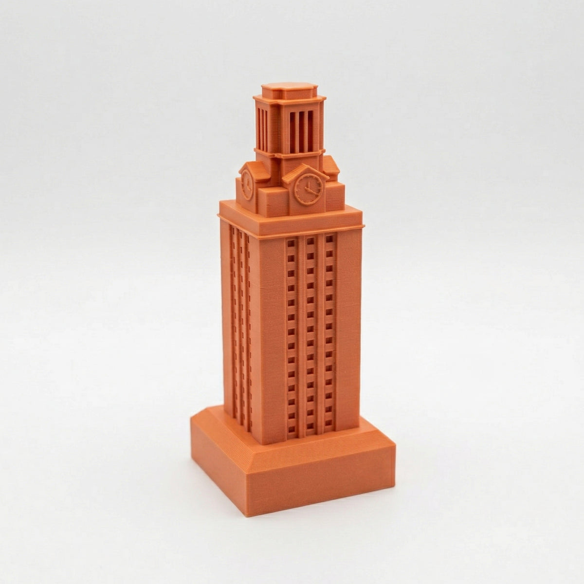 The UT Tower figurine for University of Texas alumni.