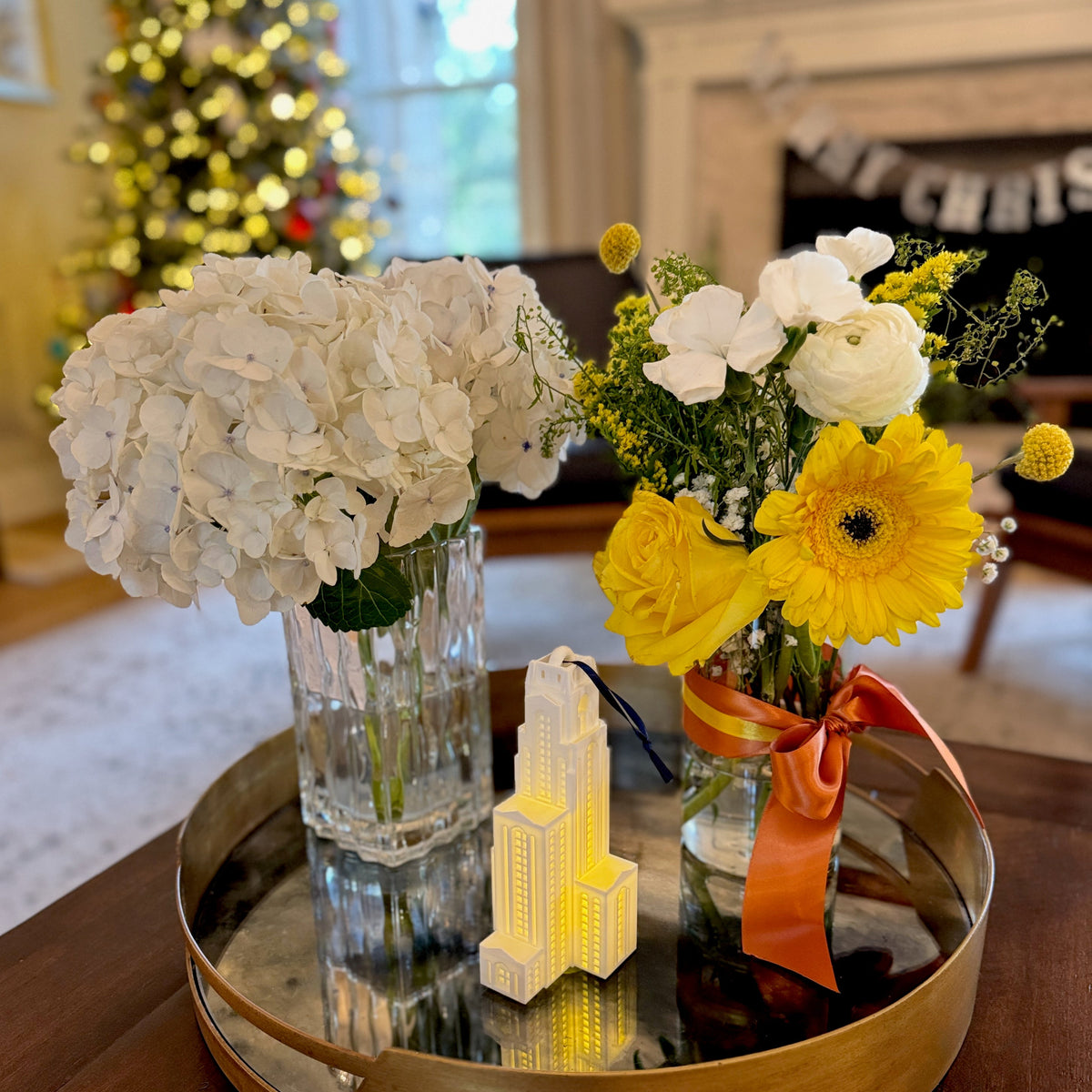 The University of Pittsburgh ornament shown in a home decorated for the Holidays.