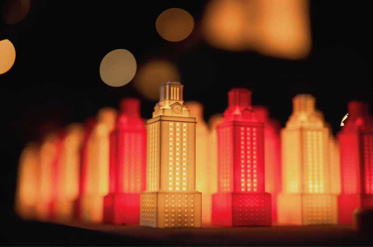 University of Texas Tower replica glowing with an LED light for night-time ambience.