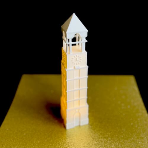 Celebrate Boilermaker pride with Purdue University gifts featuring detailed replicas of the iconic Bell Tower – perfect for students, alumni, and fans.