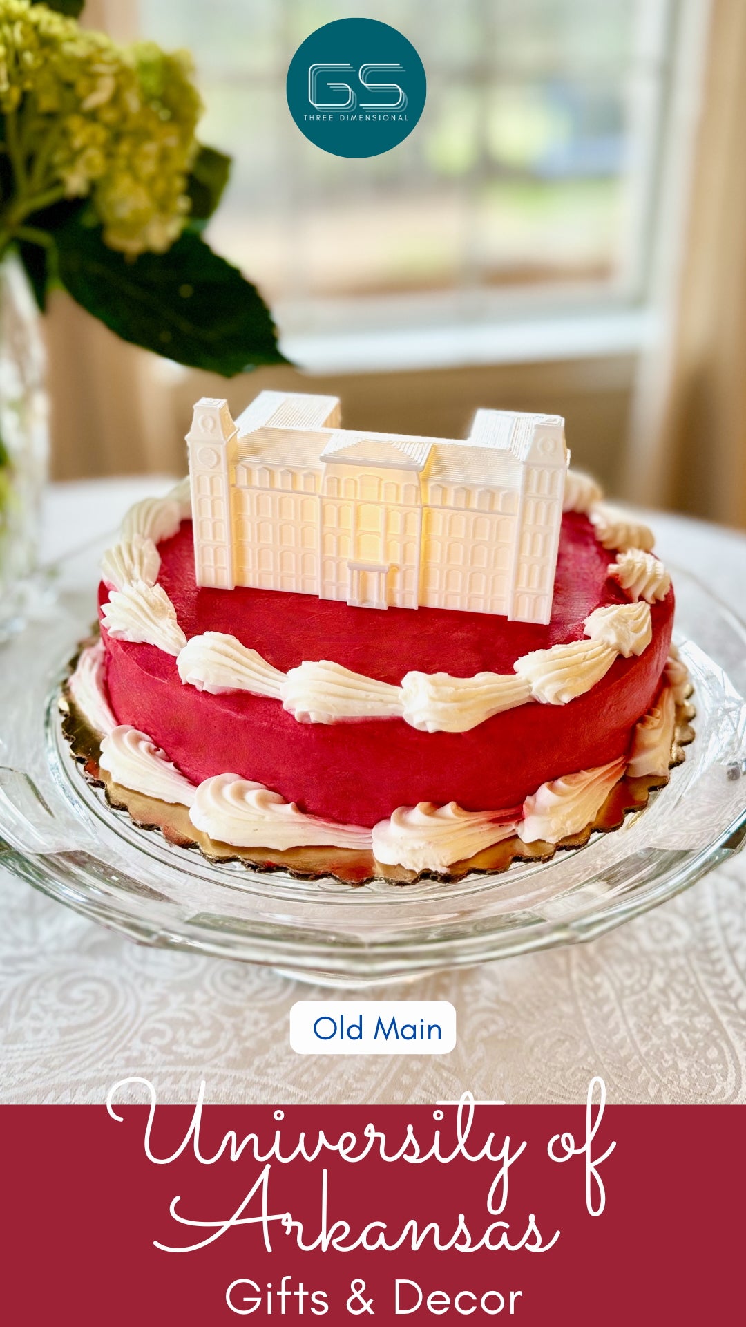 University of Arkansas cake topper with an LED light, designed as a replica of the Old Main building on the Fayetteville campus.