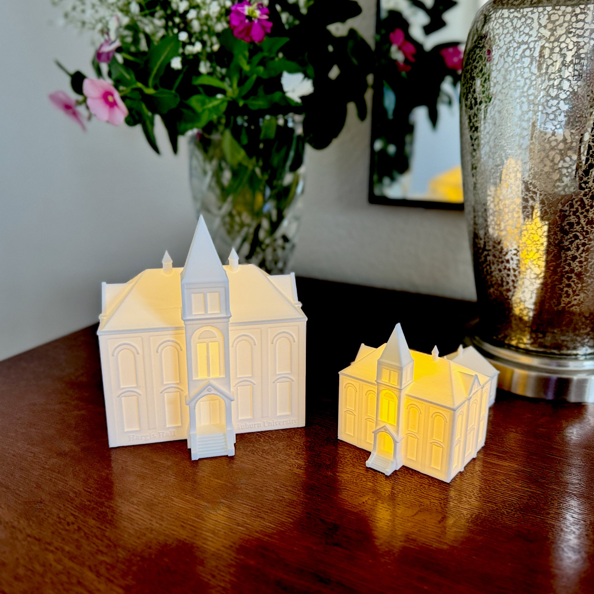 Dorm room shelf decorated with Auburn University Hargis Hall LED figurine