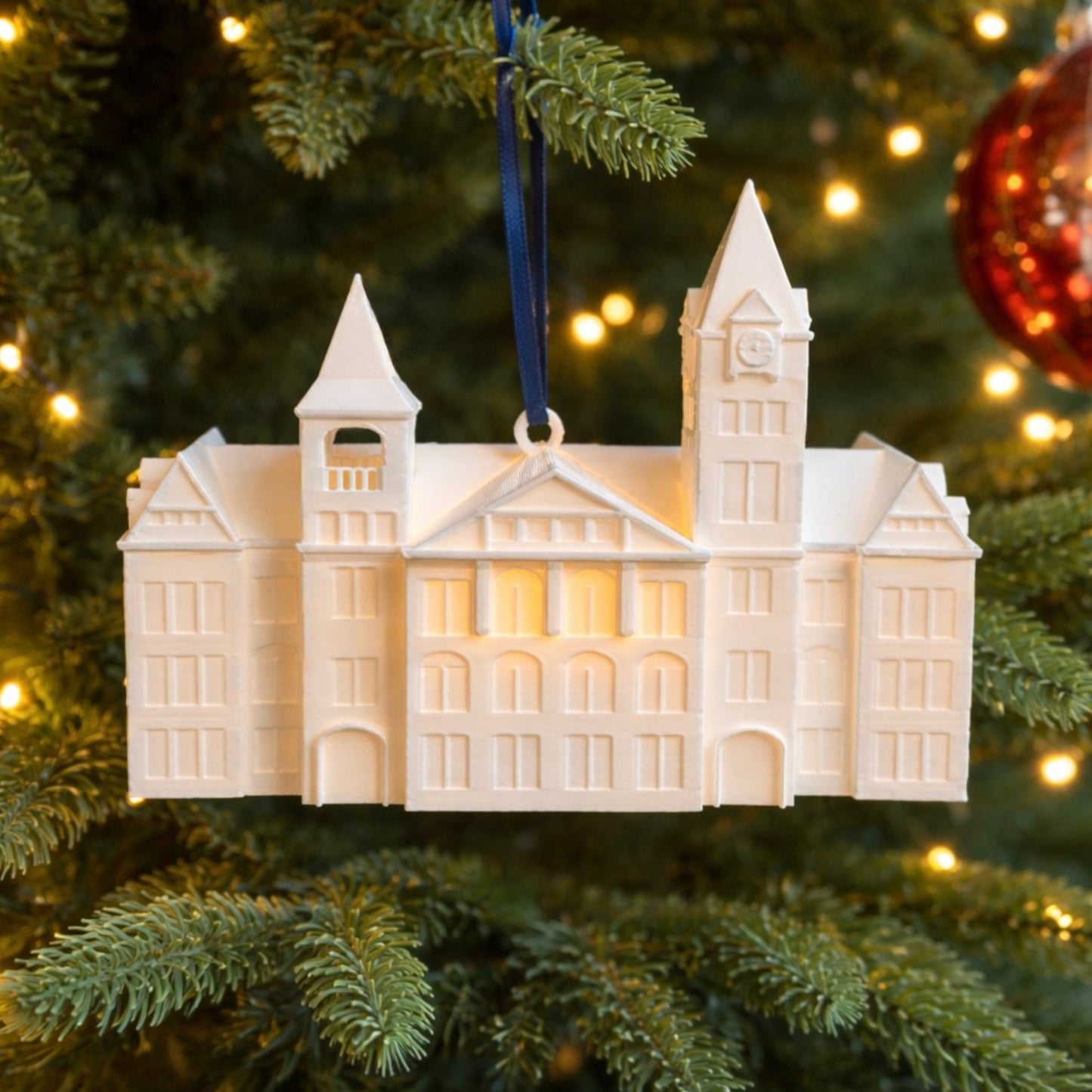 The Auburn Samford Hall ornament, shown on the tree of a Tigers fan.