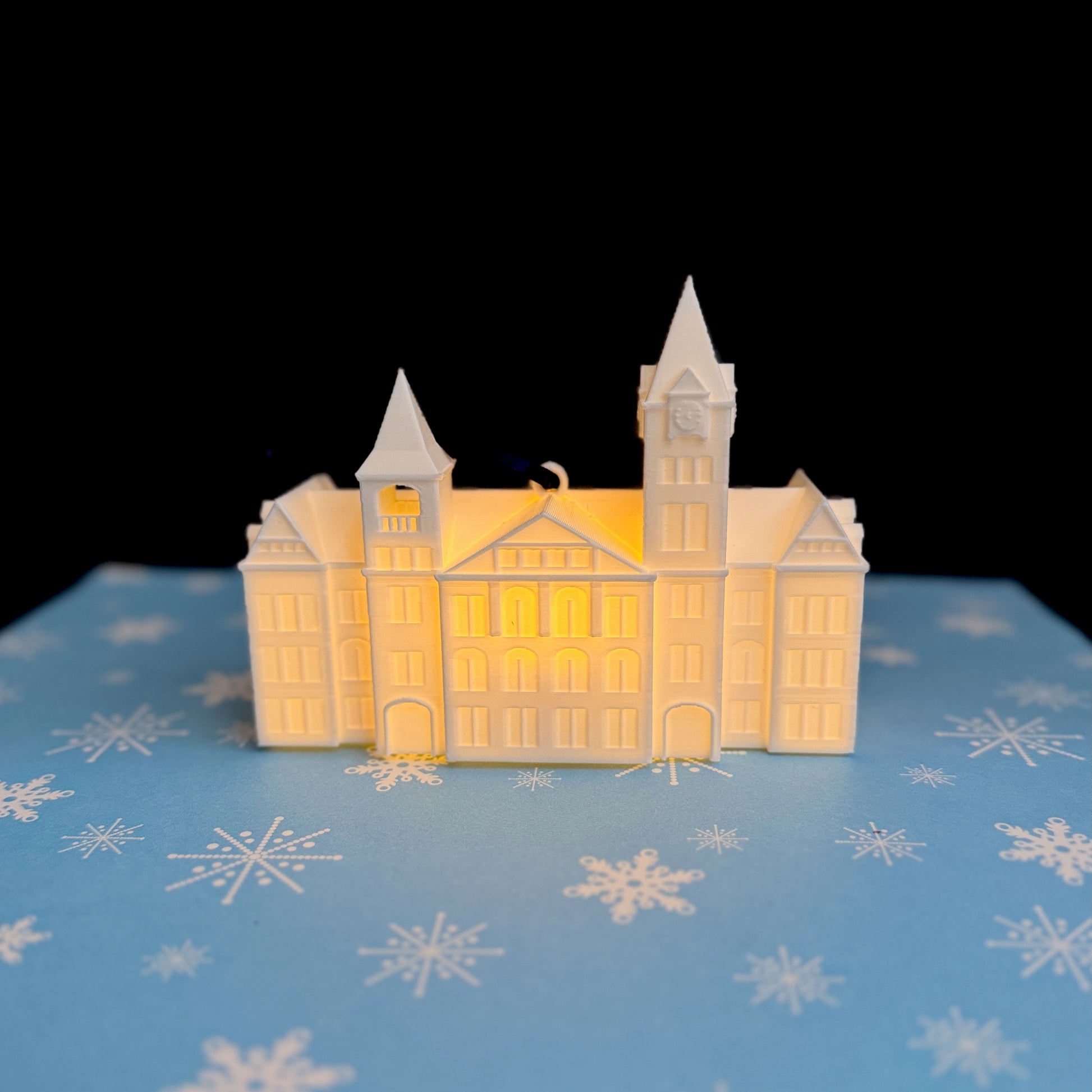 Handcrafted Auburn University ornament with LED lights, showcasing iconic Samford Hall tower.