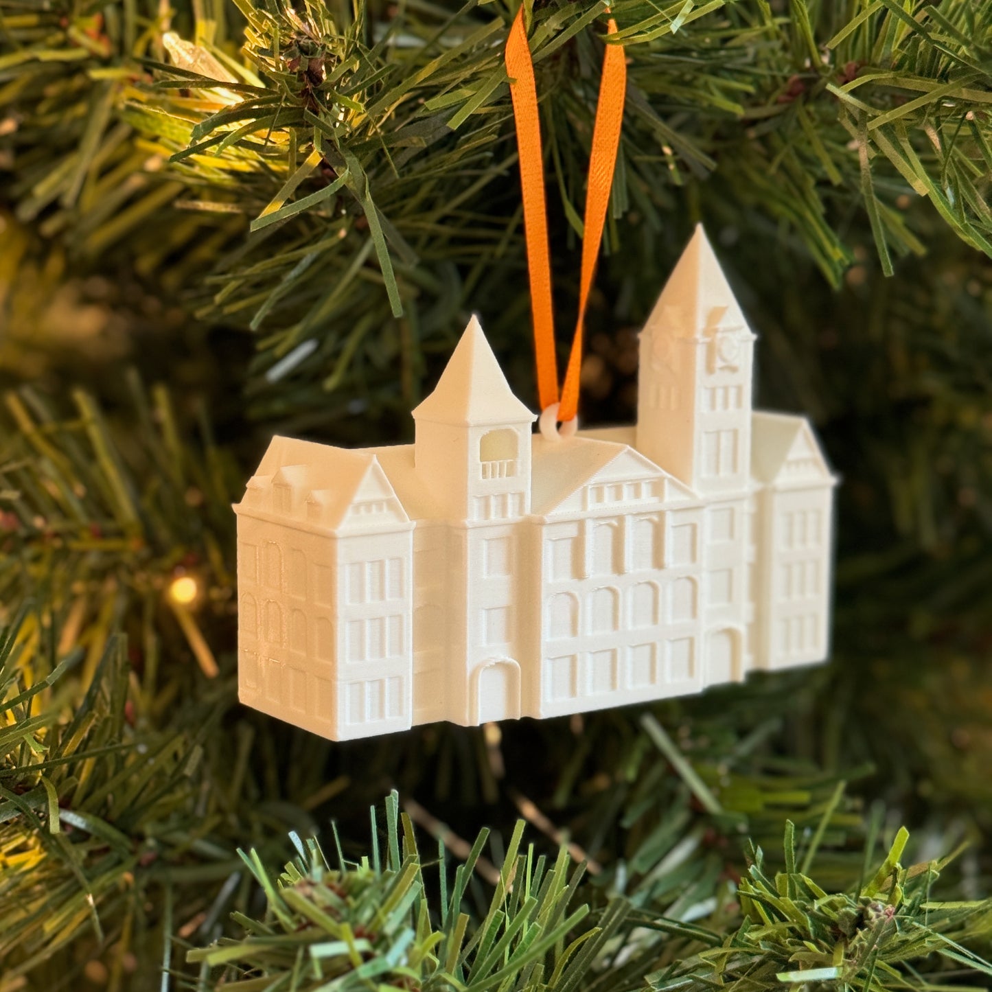 Side view of 3D printed Samford Hall ornament highlighting design texture and structure