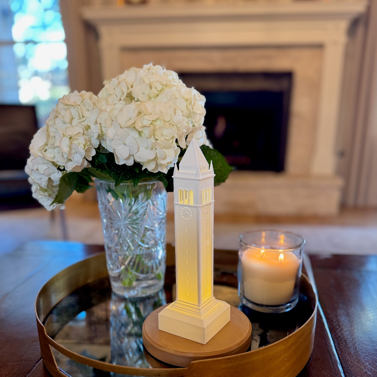 The Berkeley Campanile lamp, used as home decor and shown on a living room tray.