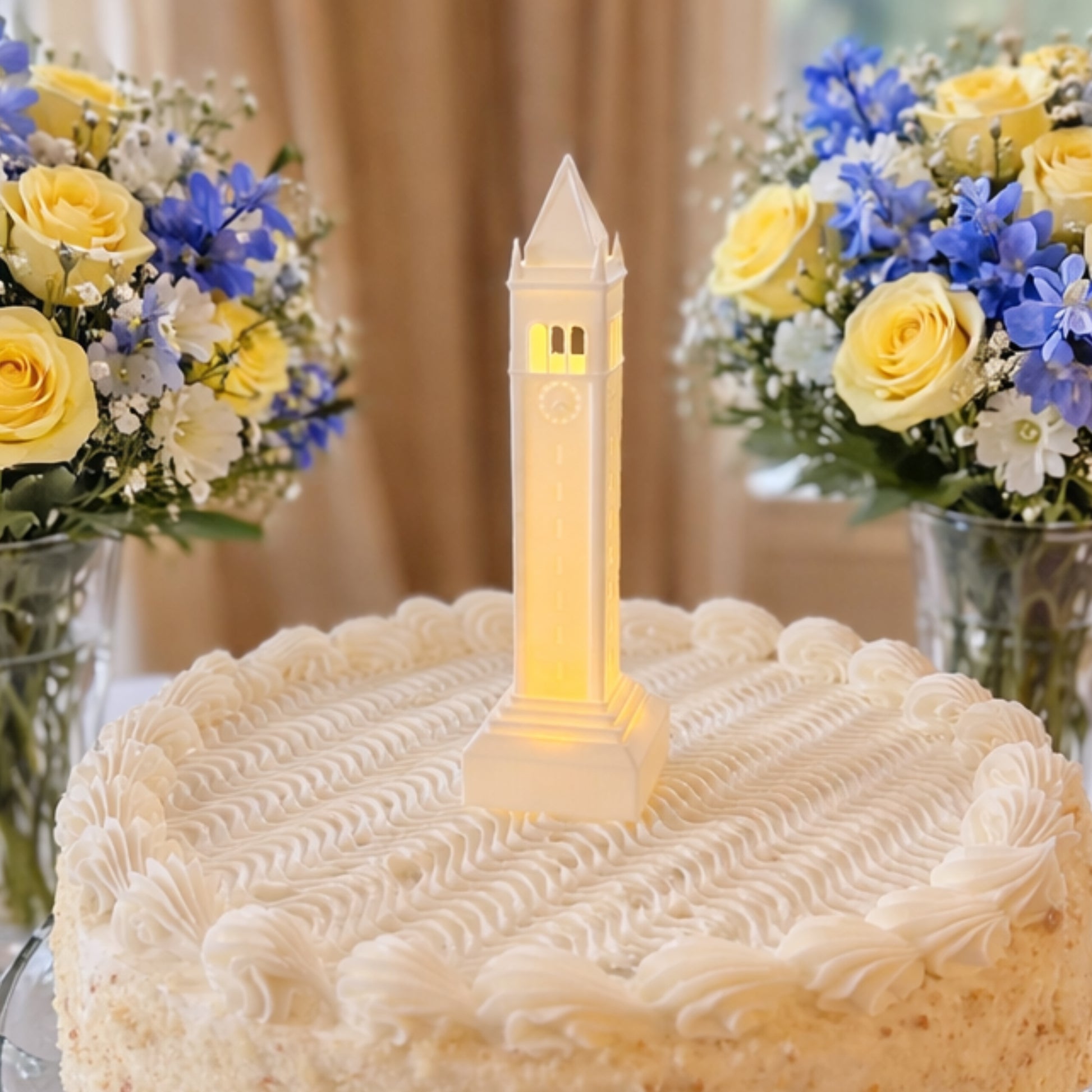 The Berkeley cake topper with LED light, designed as a replica of the Sather Tower building on campus.