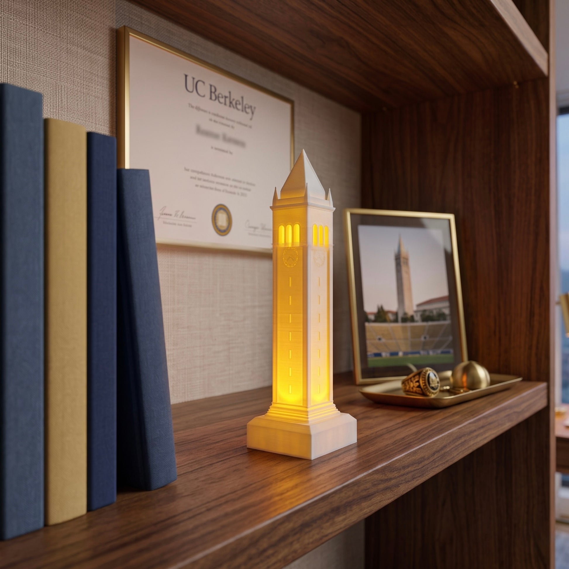 The Berkeley LED light designed as the Campanile, used as office decor and shown on a shelf.
