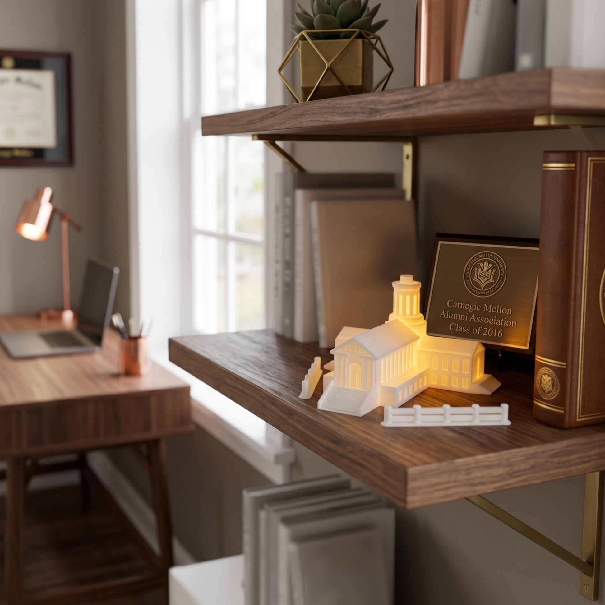 The Carnegie Mellon Lighted Figurine of Hamerschlad Hall, used as office decor on the shelf of a CM alumni.