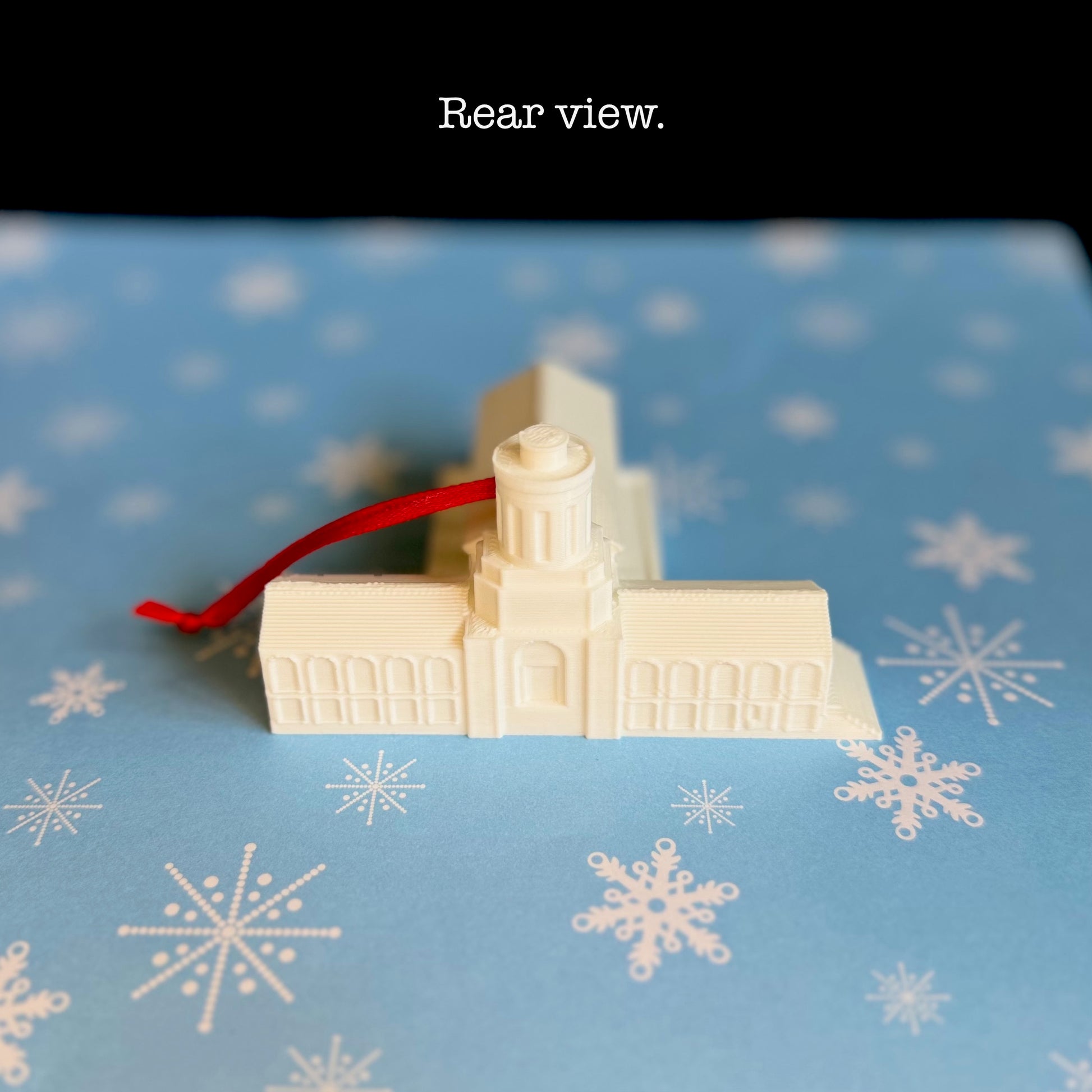 The Carnegie Mellon Ornament christmas ornament, shown from behind.