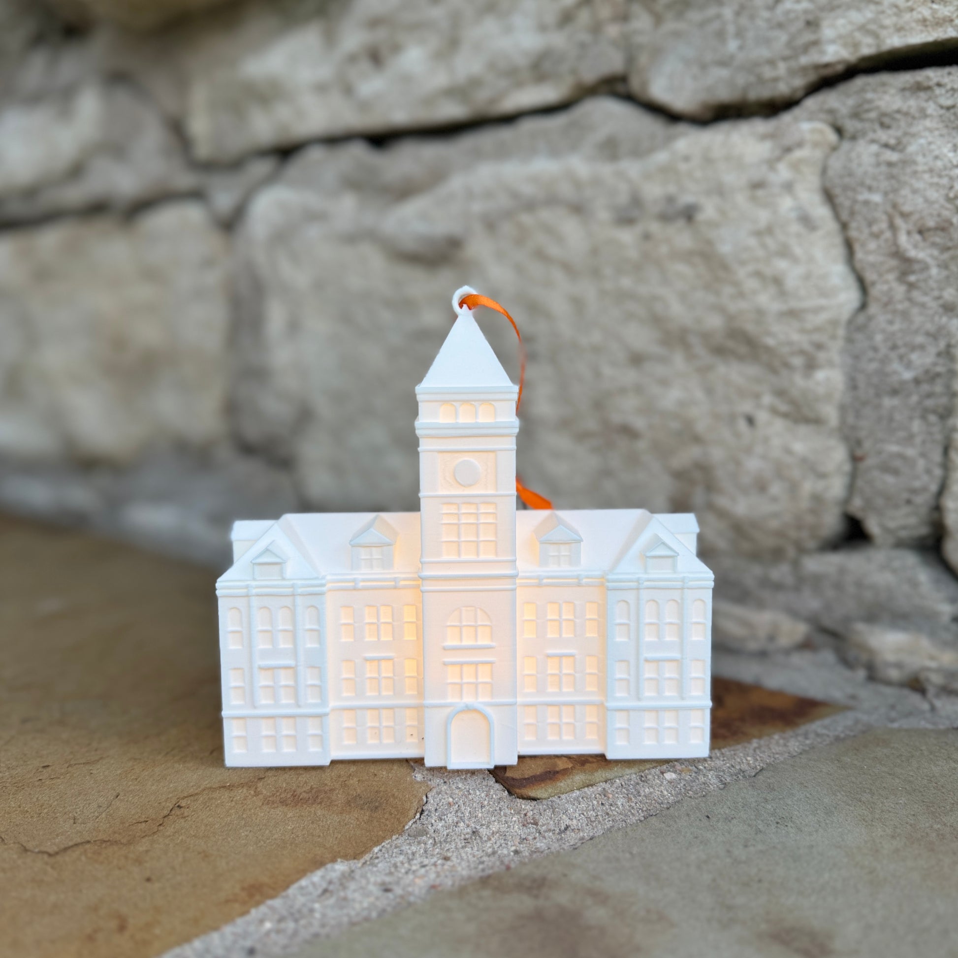 The Clemson ornament with a light, designed as Tillman Hall.