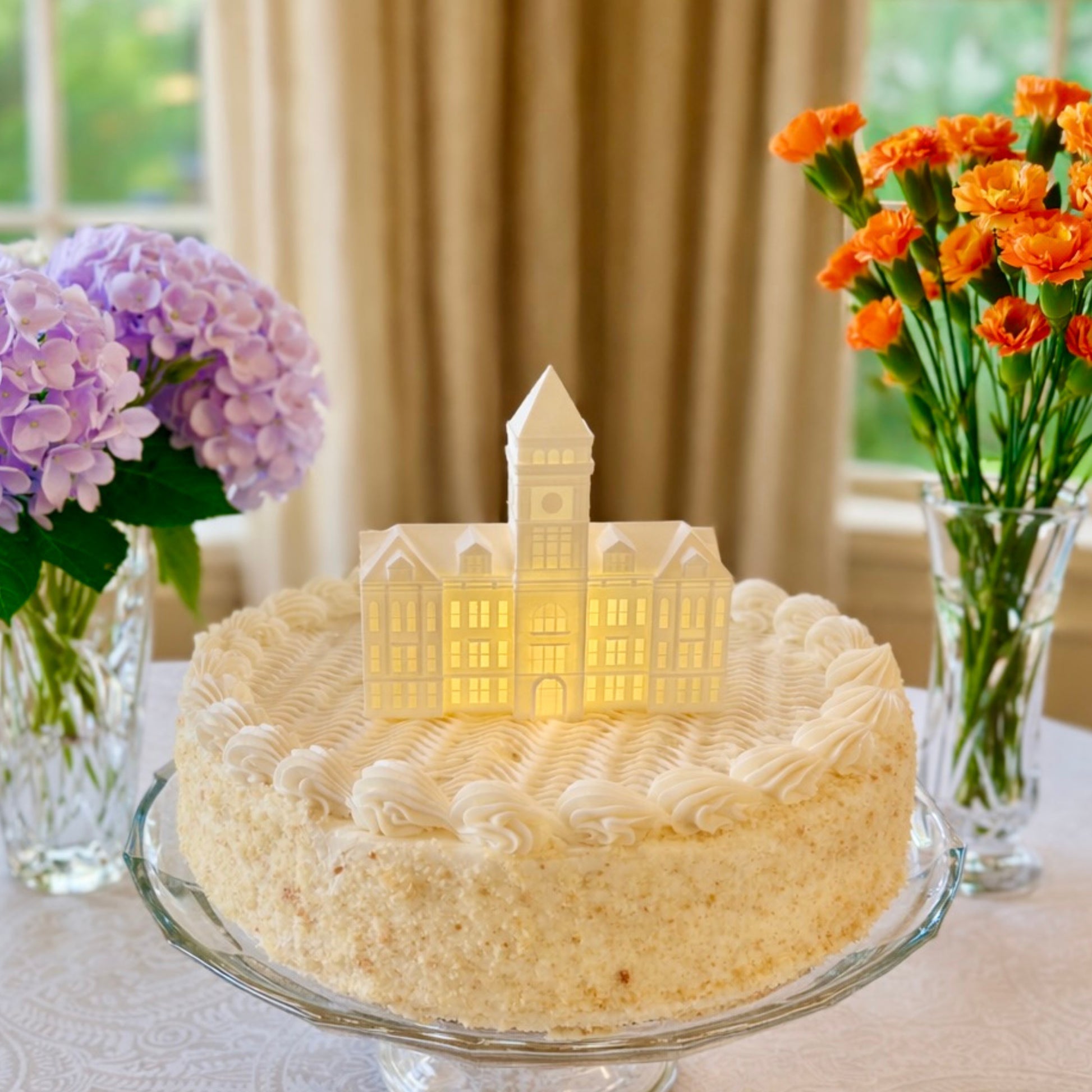 The Clemson cake topper figurine, shown on a graduation or groom's cake for a Clemson alumni.