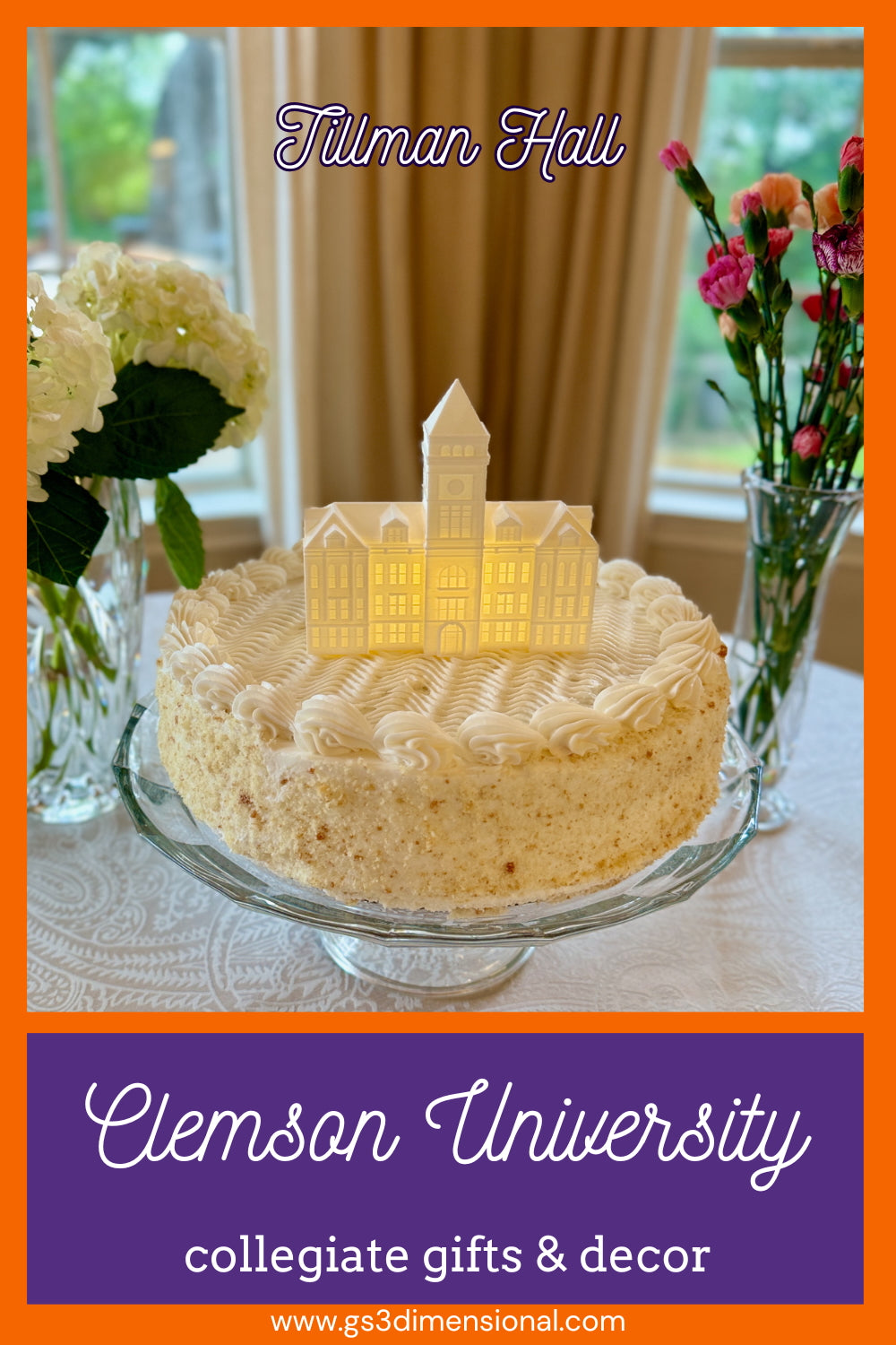 Decorative cake with Tillman Hall design on a table with flowers that could be a setting for a wedding or graduation.