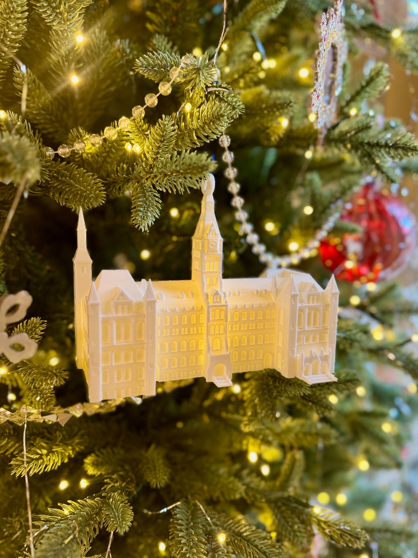 College Ornament for Georgetown alumni, featuring the Healy Hall building and shown on a Christmas tree.