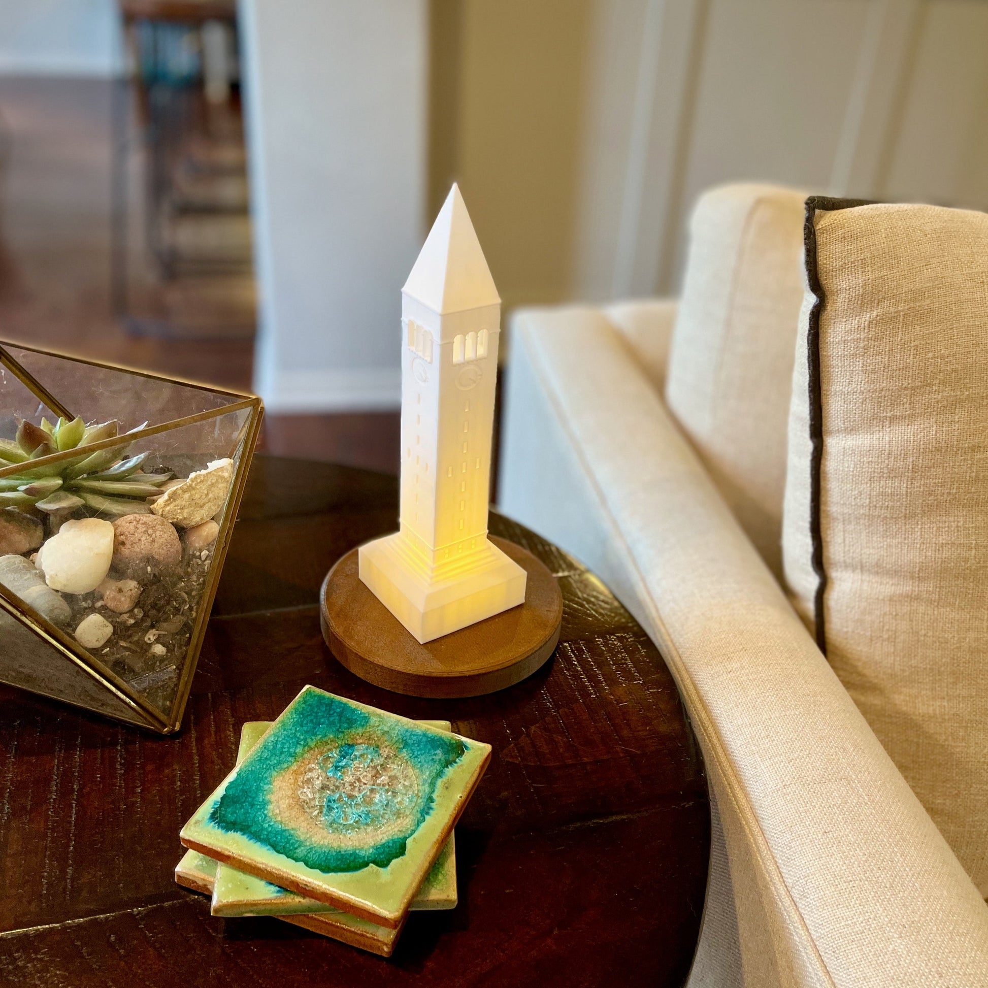 The Cornell lighted figurine, shown on a side table.