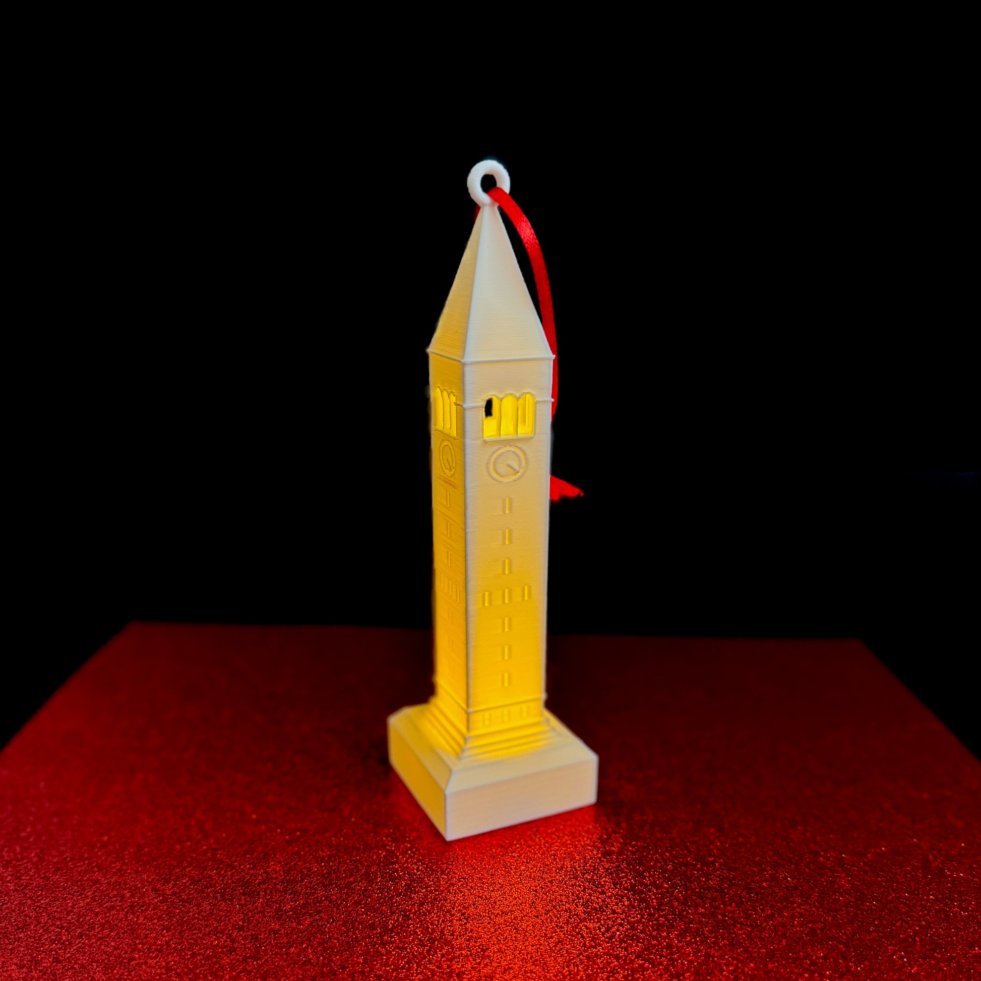 The lighted Cornell ornament depicting McGraw Tower.