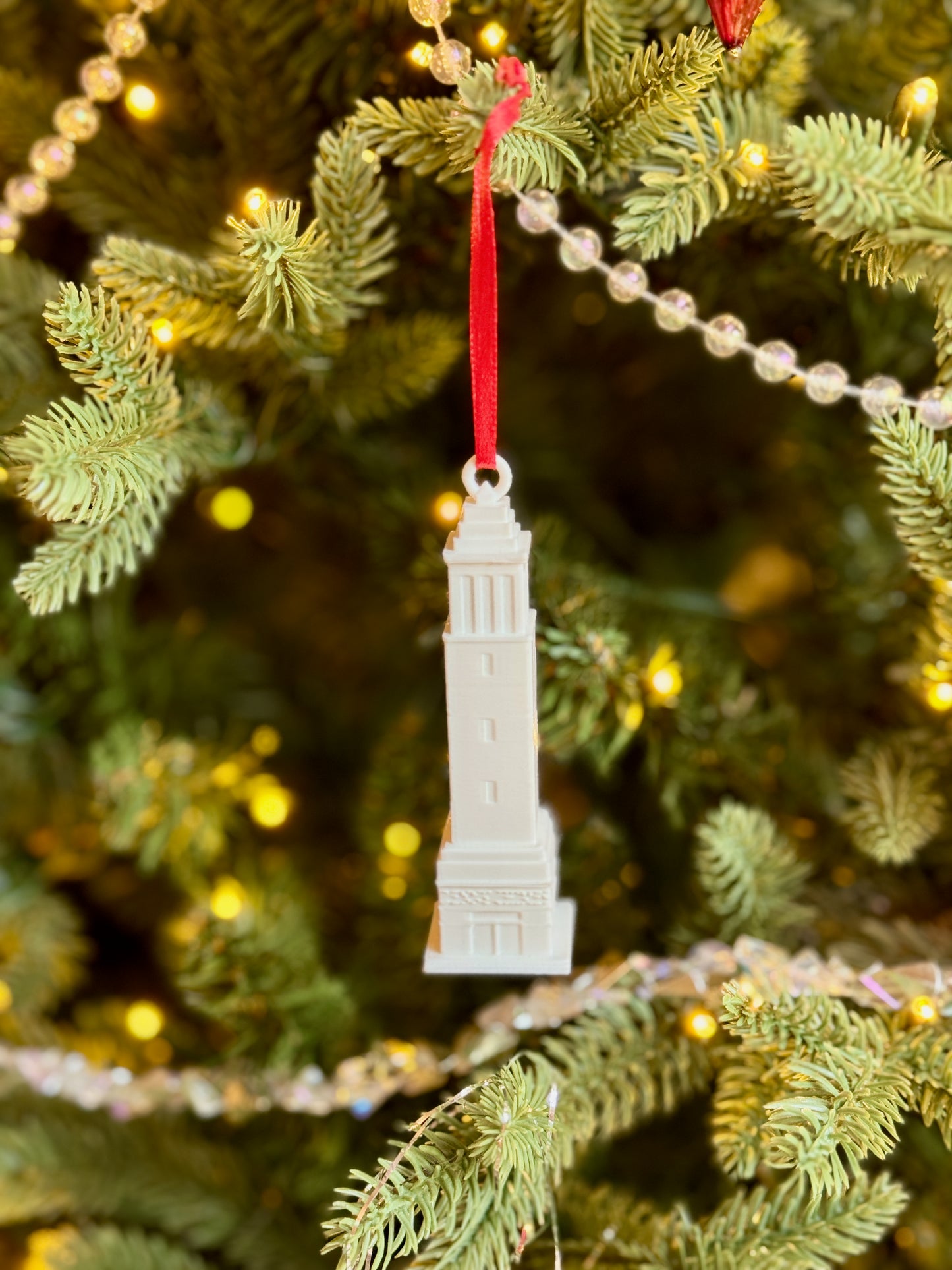 Front view of the Denny Chimes ornament for University of Alabama alumni.