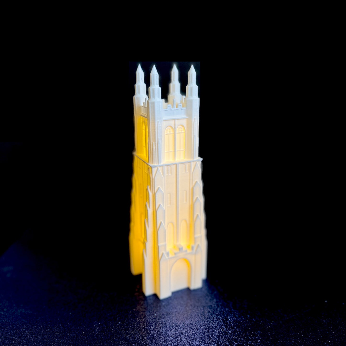 The Duke Chapel lighted figurine, used as a gift for Duke students.