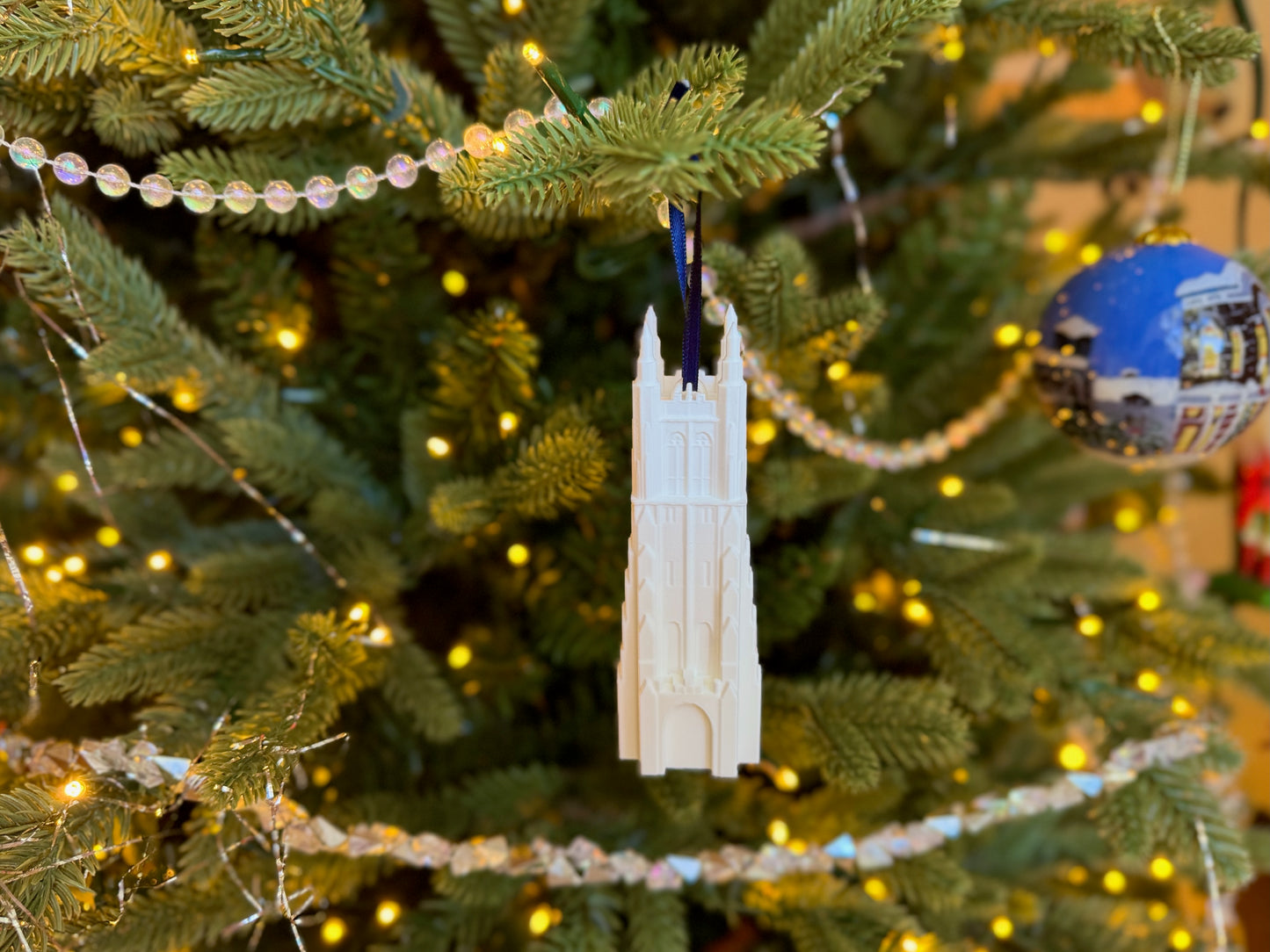 Duke University Ornament designed as the Duke Chapel and show on a Christmas tree.