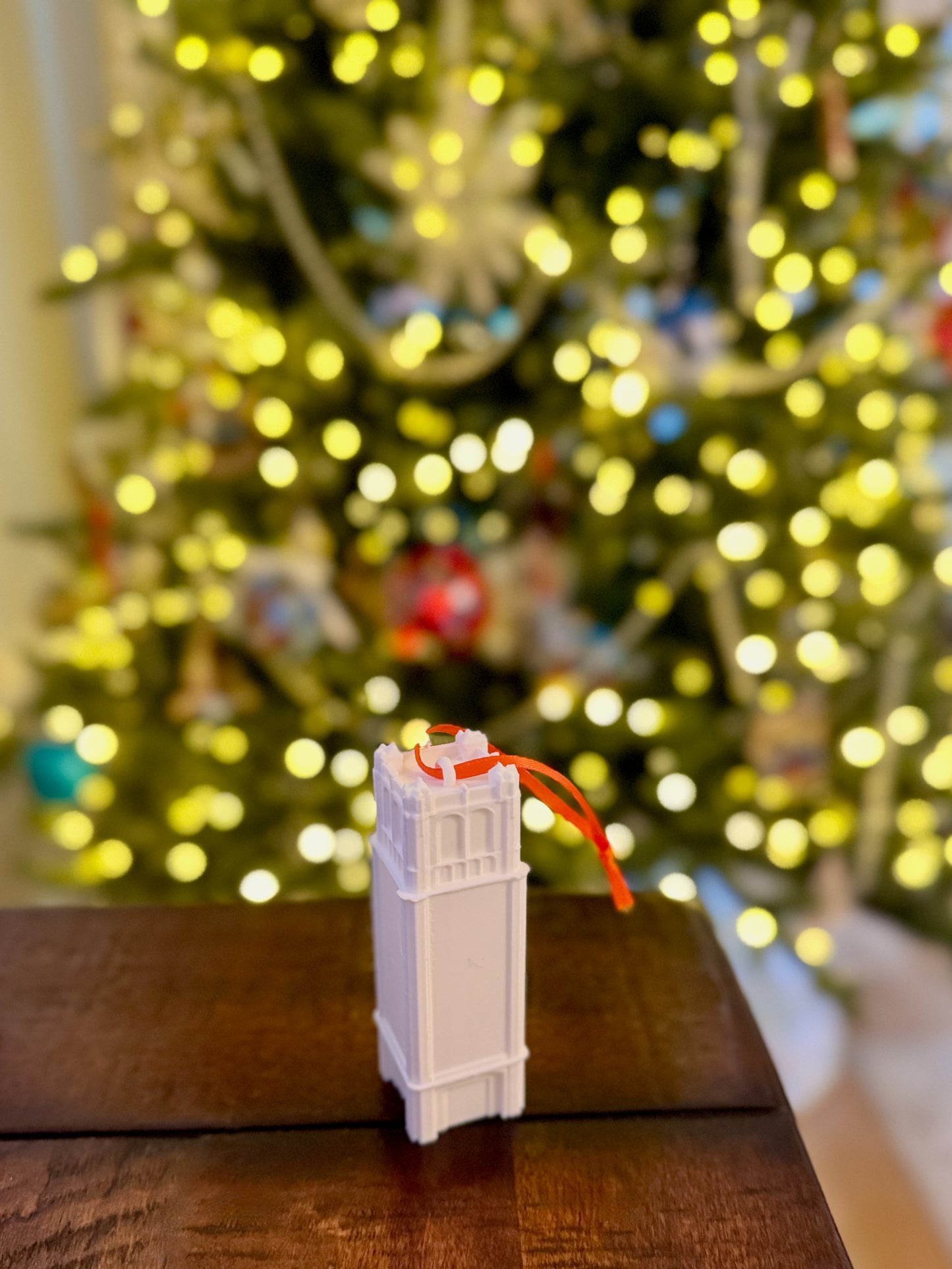 The Florida Gators Christmas ornament shown in a home decorated for the holidays.