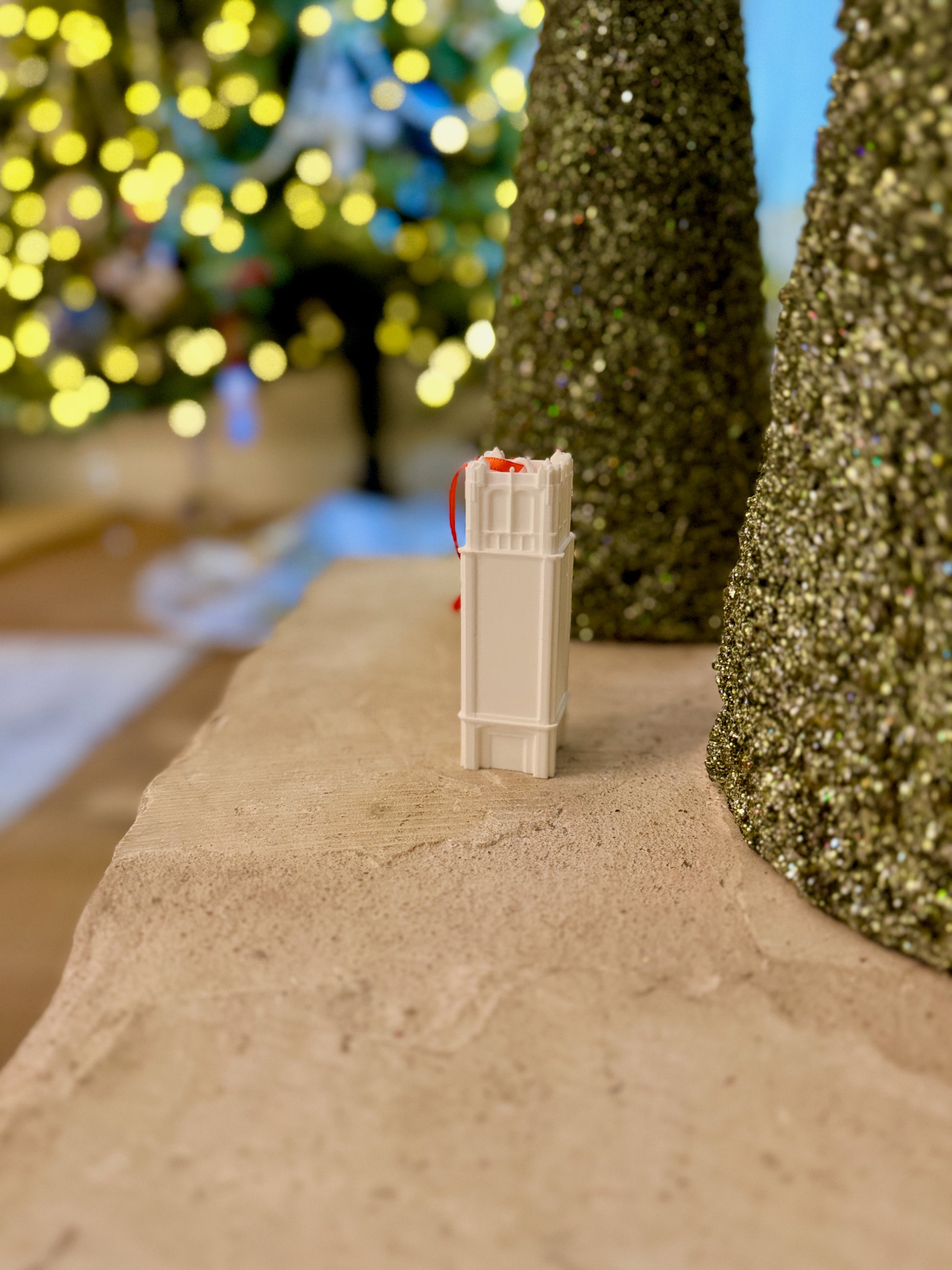 Florida Gators Christmas ornaments designed as the Century Tower building on the Gainesville campus.