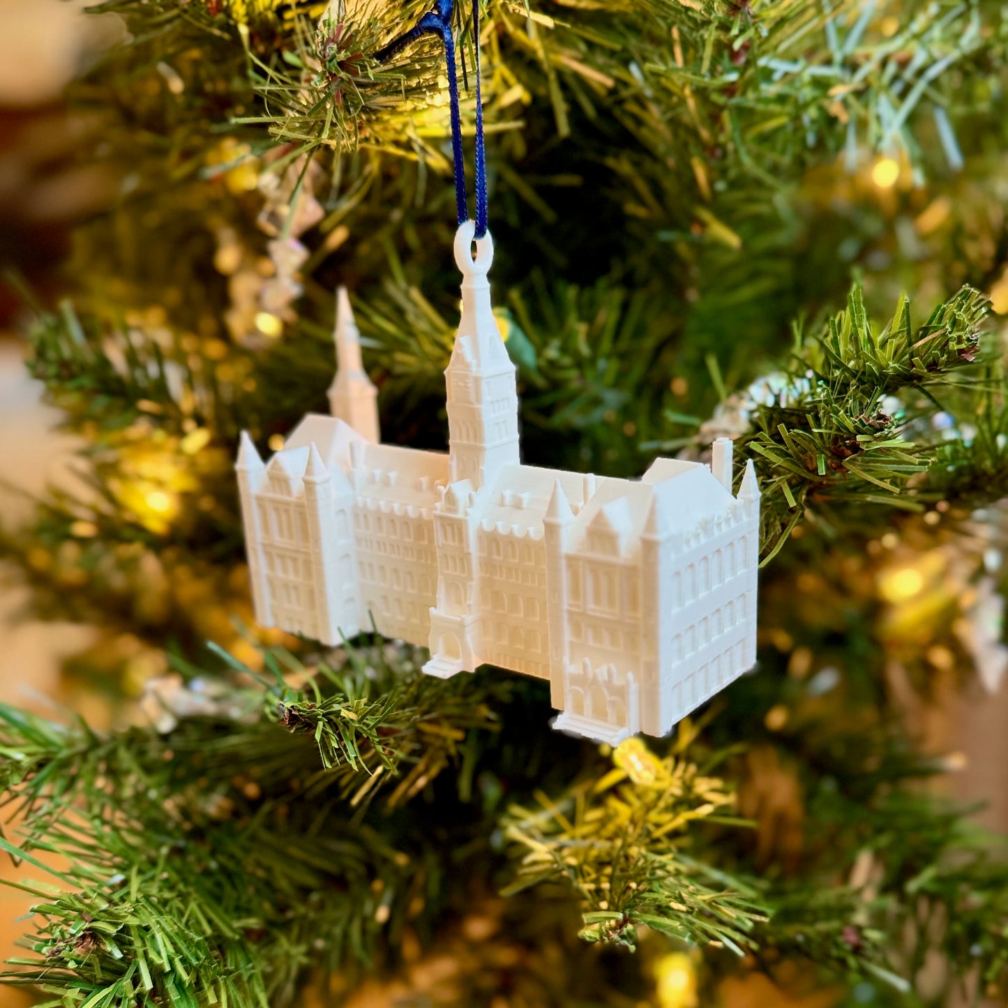 The Georgetown Healy Hall ornament, shown on a Georgetown Christmas tree.