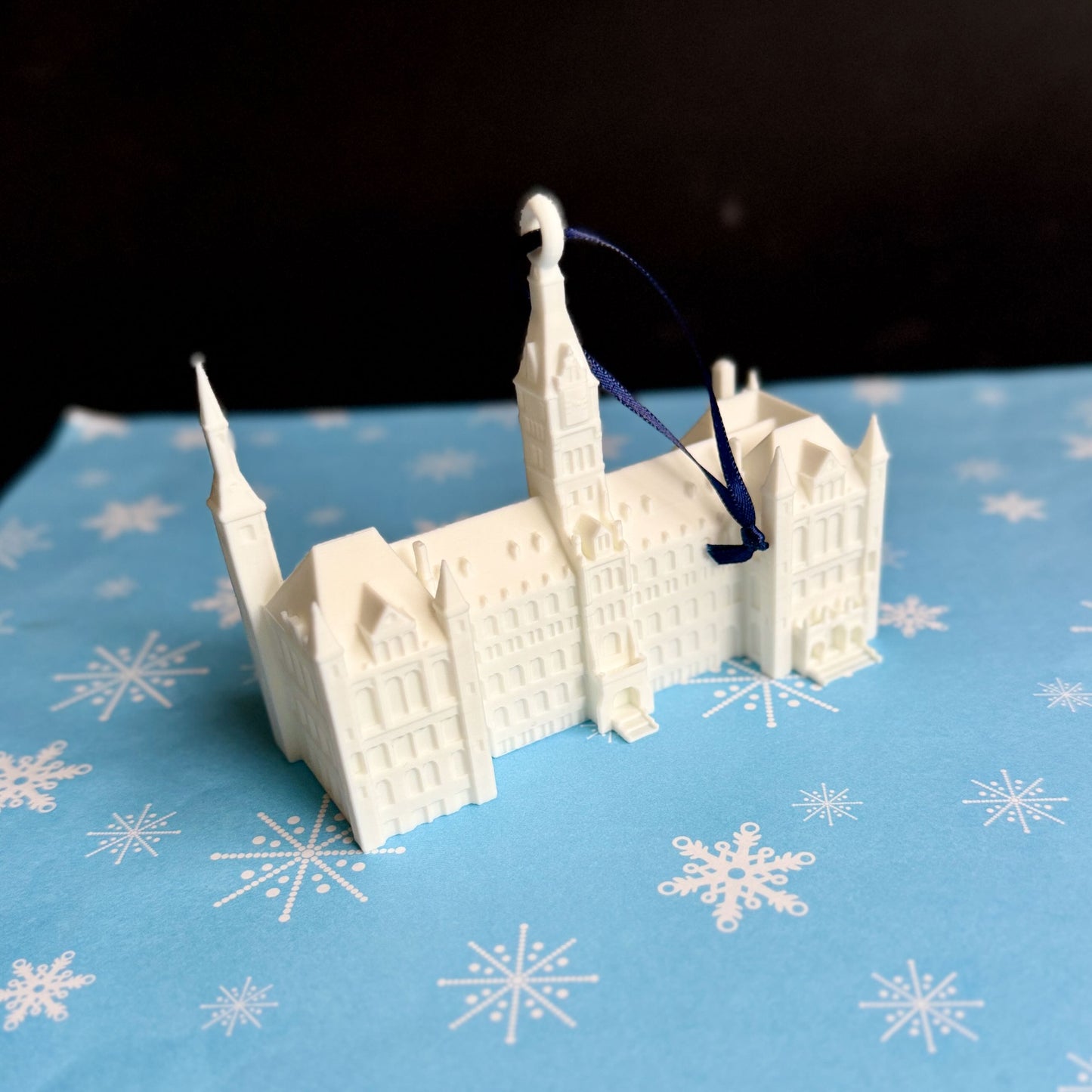 Side view of the Georgetown University ornament representing the Healy Hall campus building.