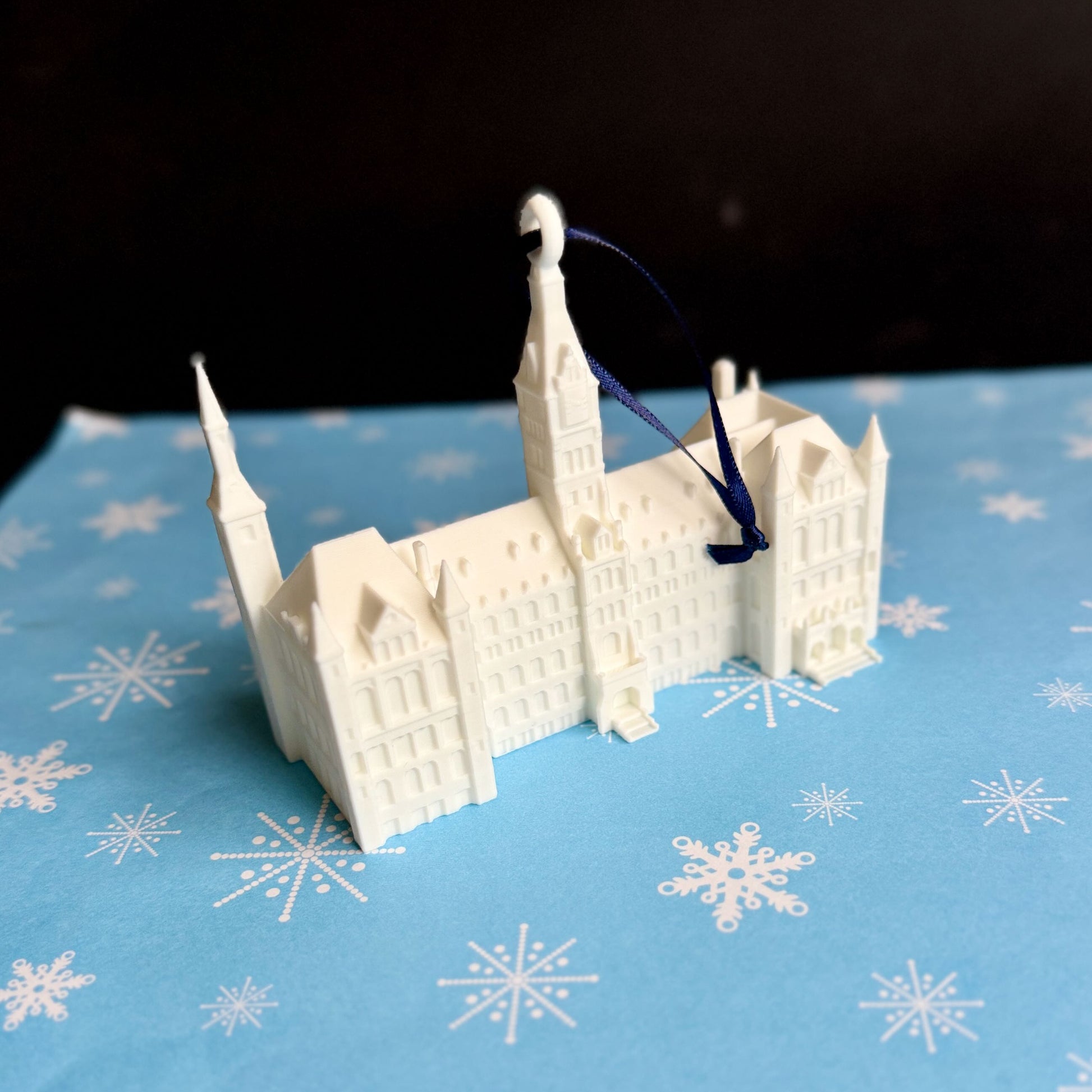 Side view of the Georgetown University ornament representing the Healy Hall campus building.