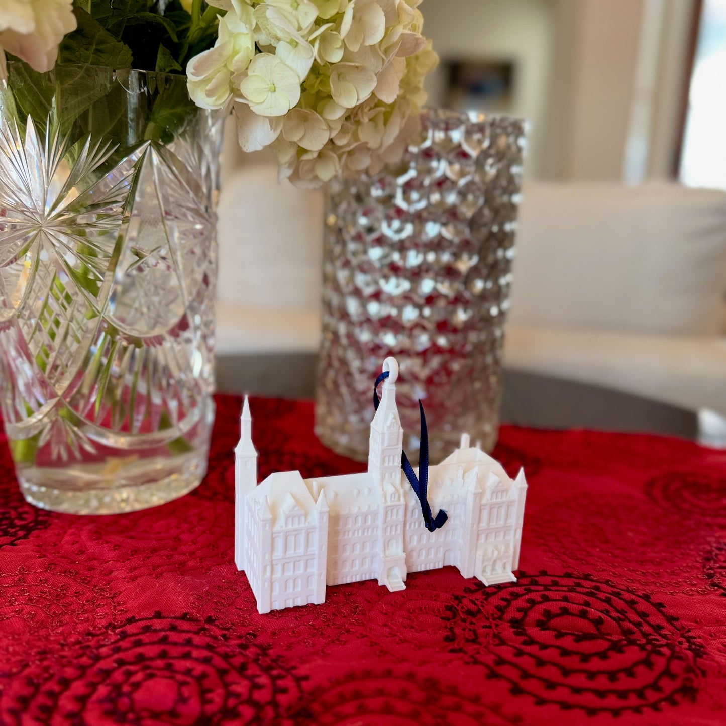 The Georgetown ornament of Healy Hall, shown in a home decorated for Christmas.