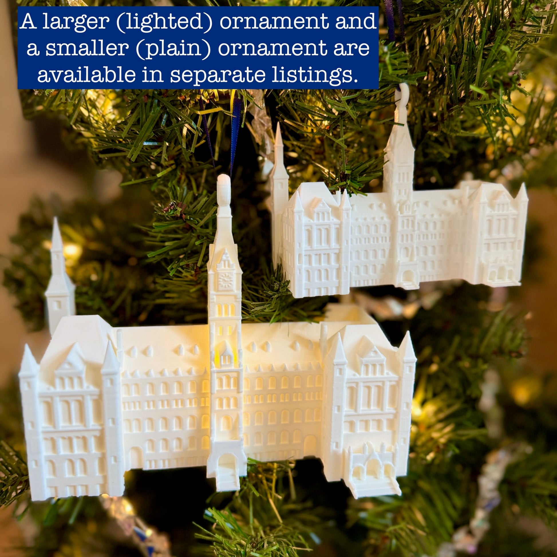 The Georgetown ornaments shown in two sizes and representing Healy Hall.