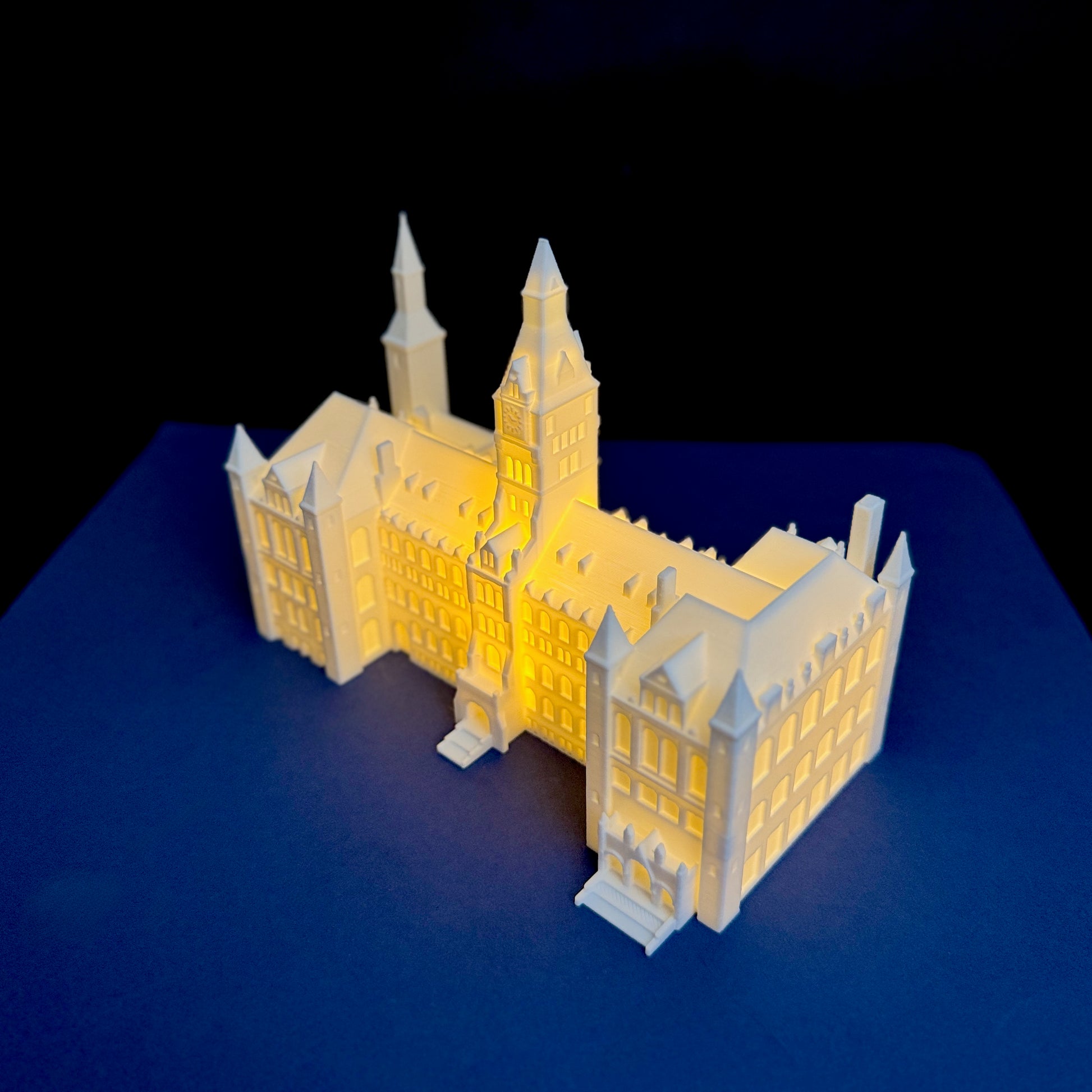 Side view of the Georgetown University keepsake figurine, designed as Healy Hall.