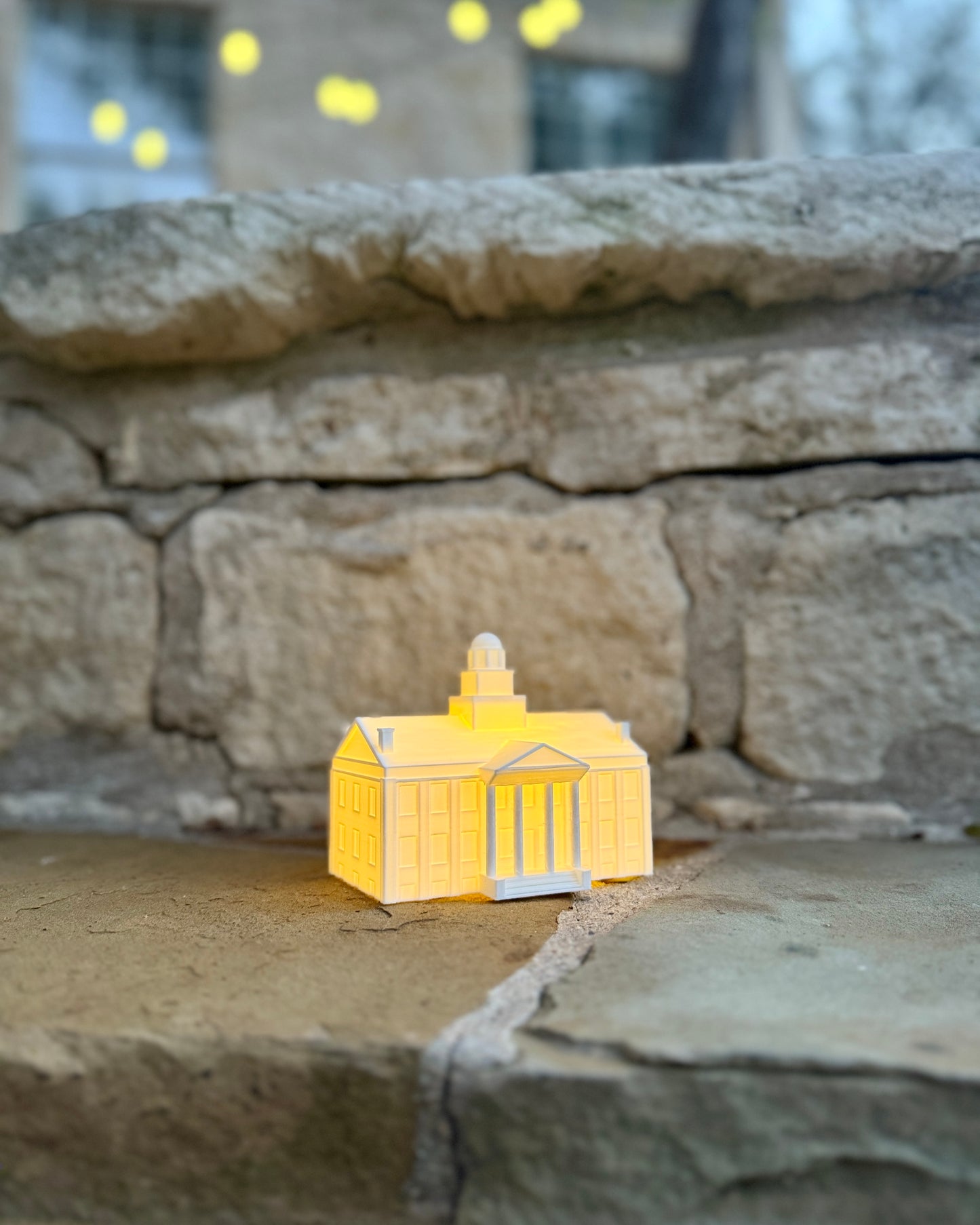 Iowa Hawkeyes figurine of Old Capitol, used as party decor and shown at a wedding.