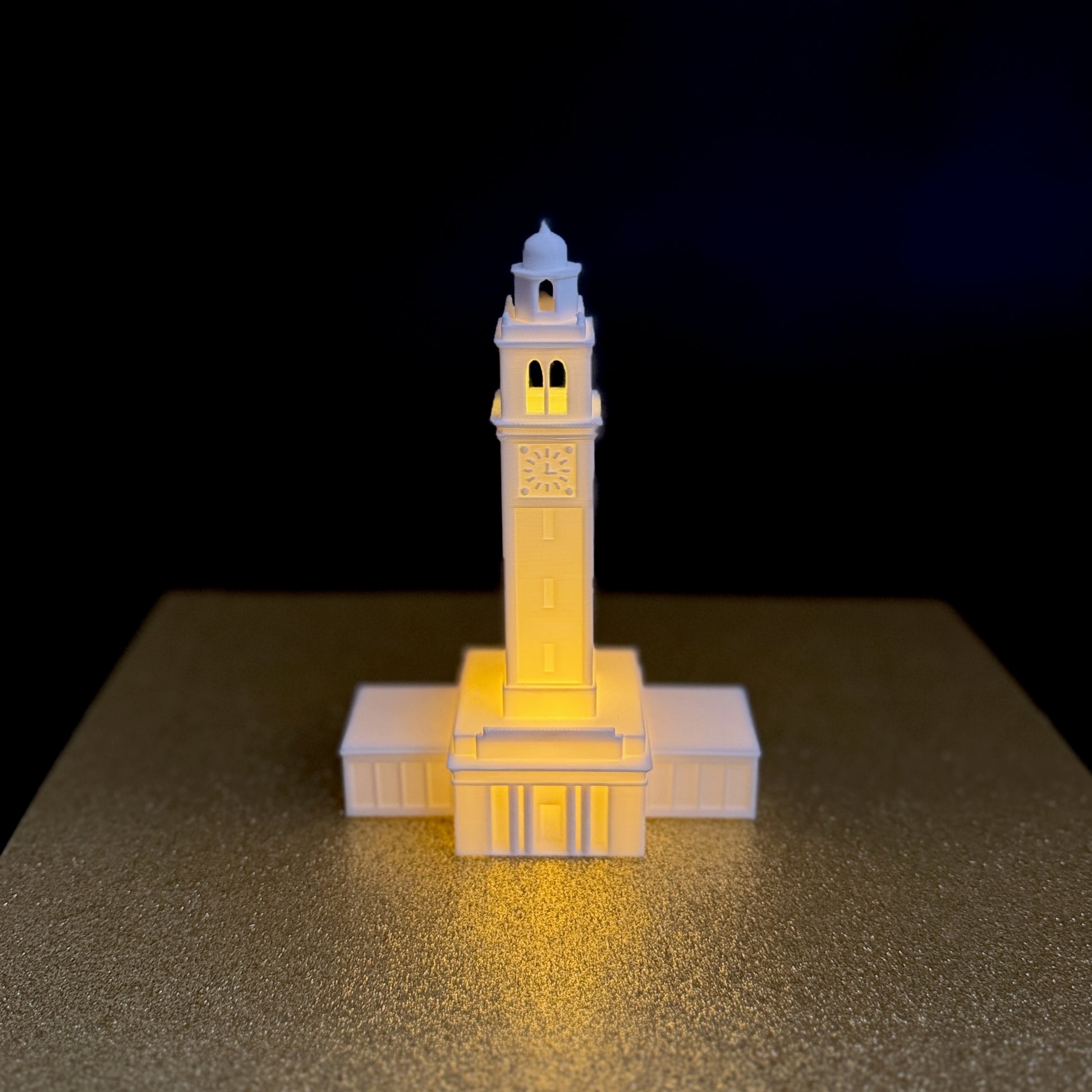 The LSU Memorial Tower figurine, used as a keepsake.