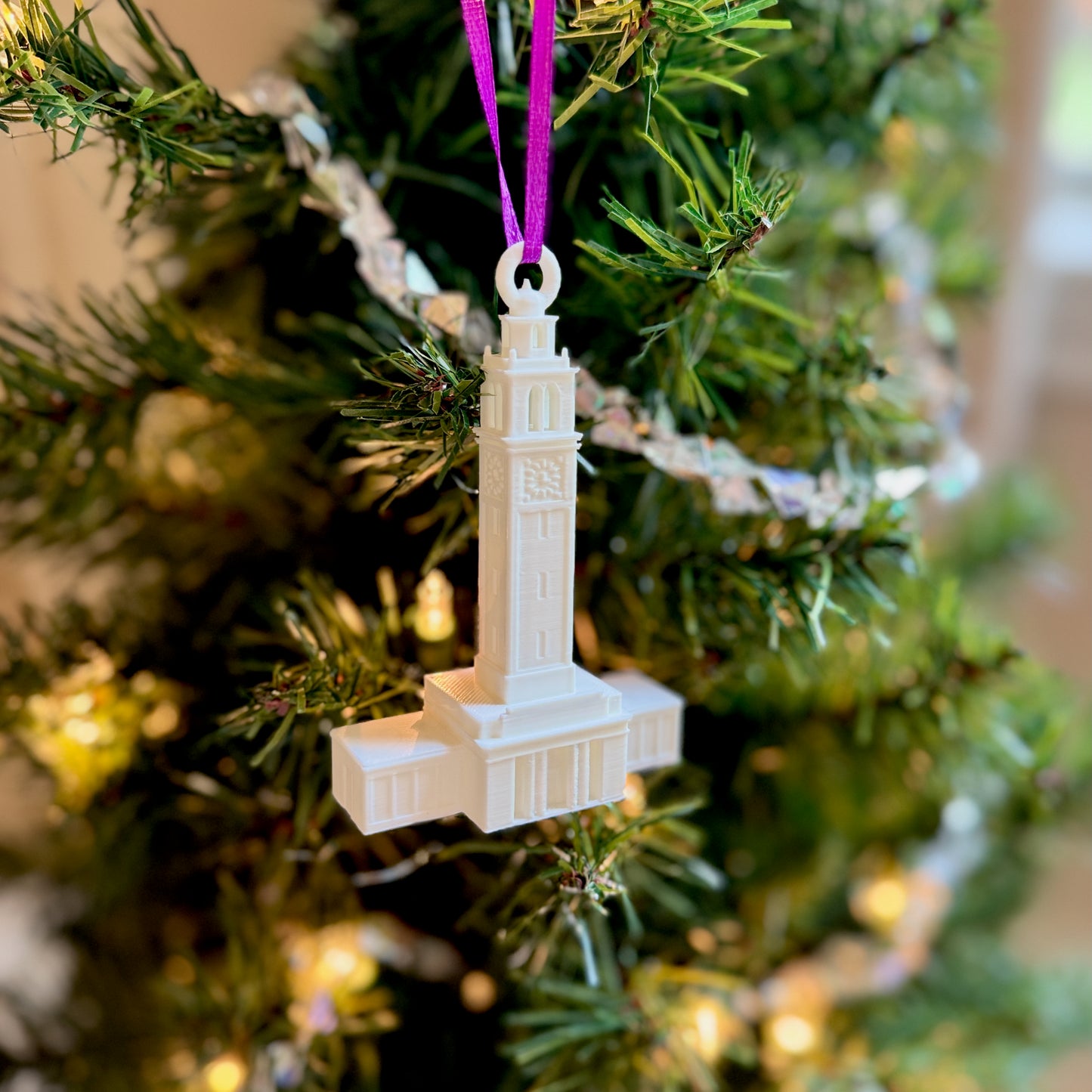 The LSU ornament, shown on a tree.