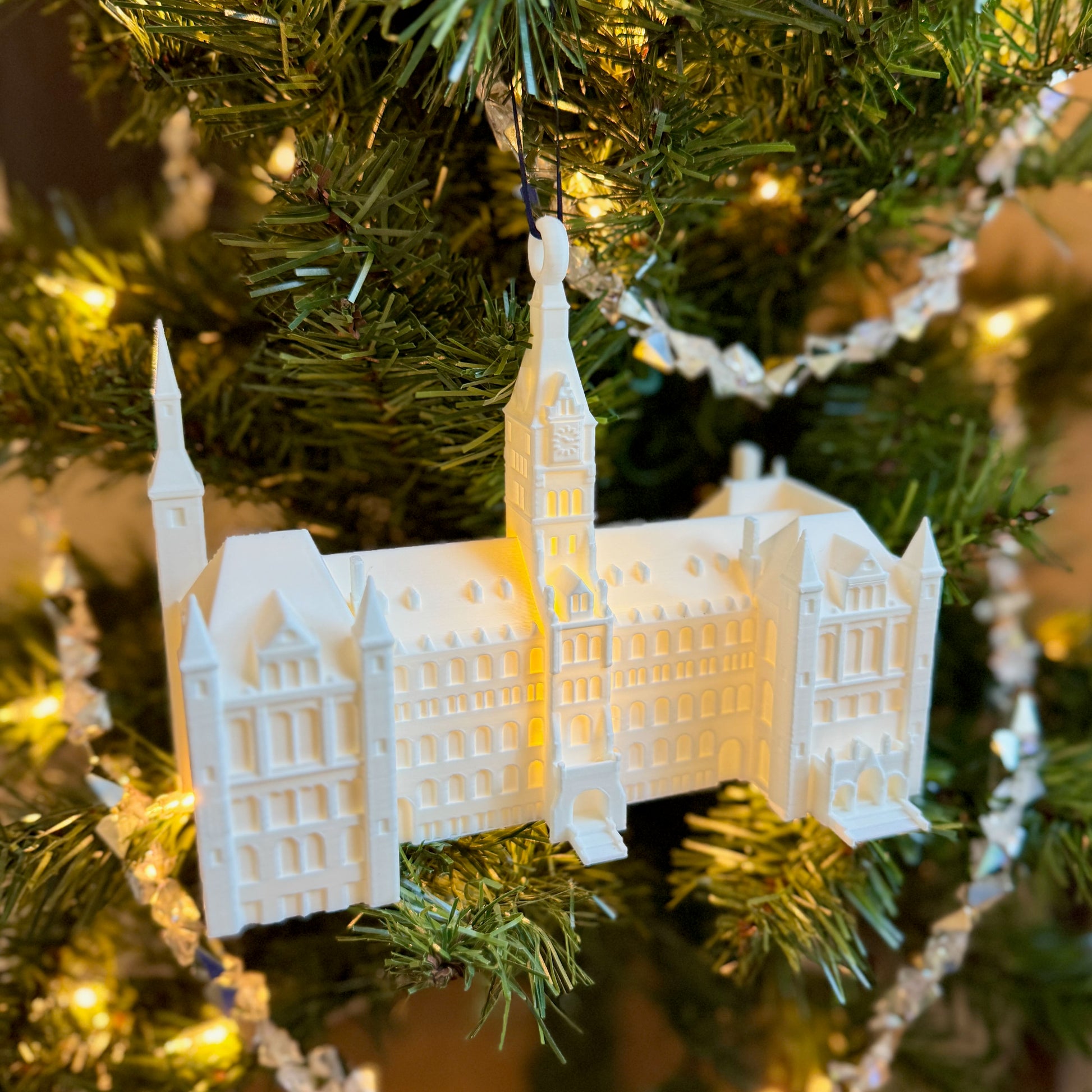 The lighted Georgetown University ornament designed as a replica of the Healy Hall building at the center of campus.
