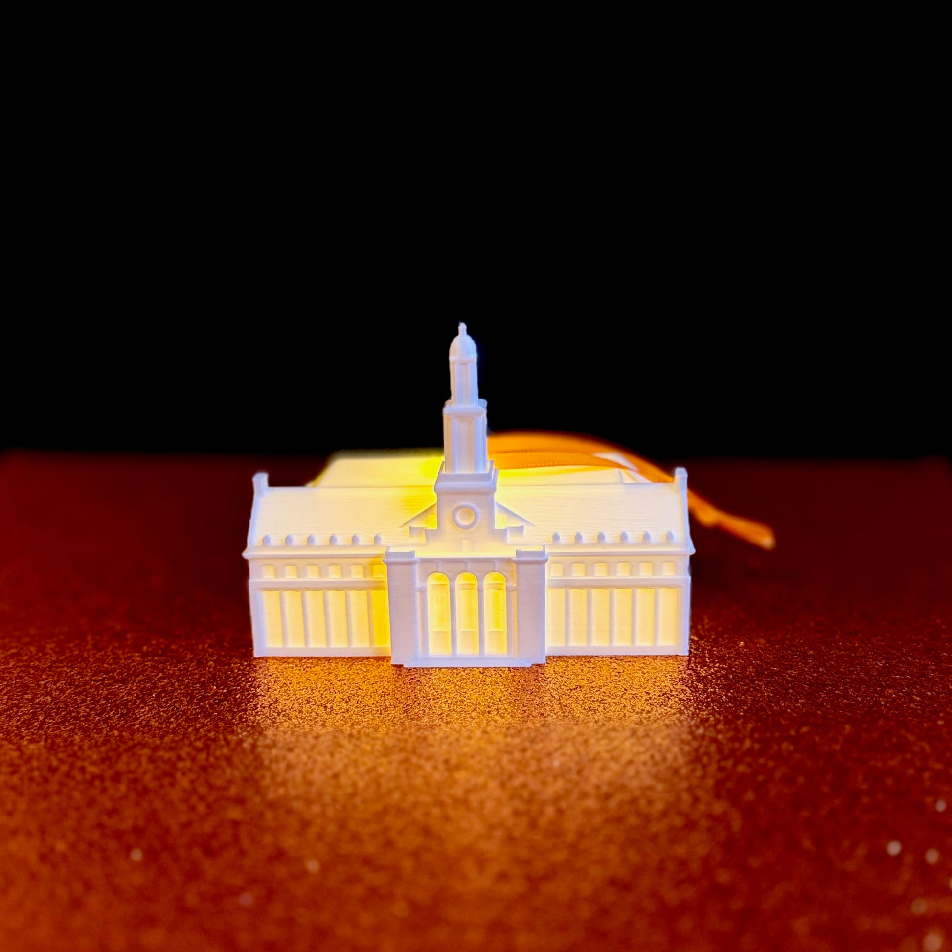 Glowing LED Edmon Low Library Christmas ornament for Oklahoma State Cowboys fans.