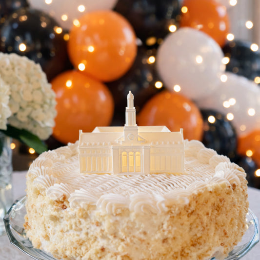 An Oklahoma State University cake topper, shown on an OSU graduation cake.