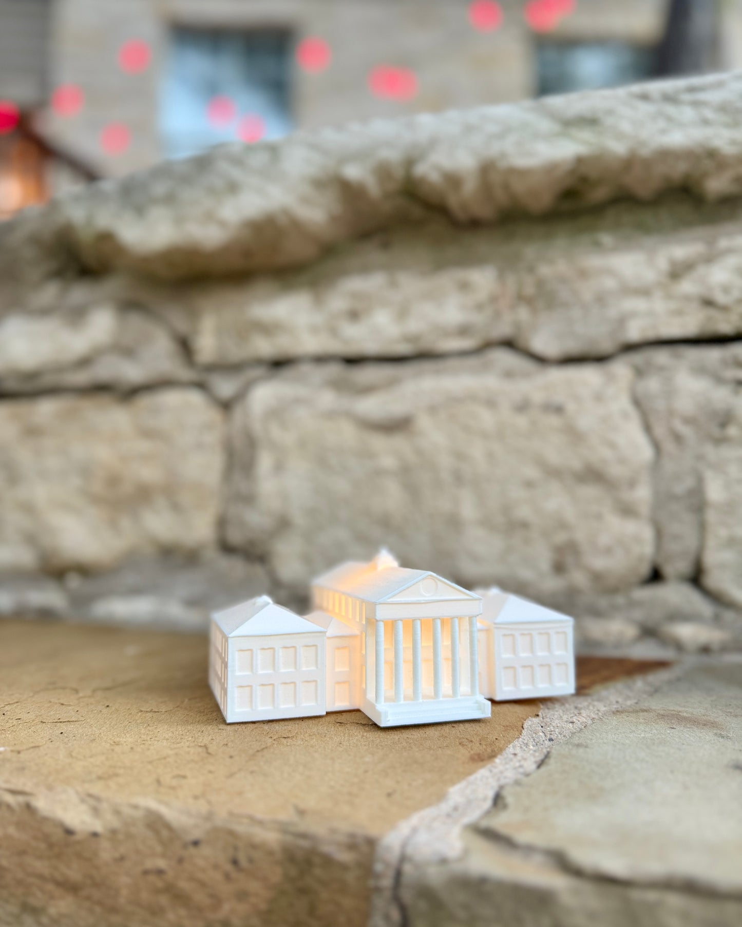 The Lyceum figurine with an LED light, used as Ole Miss decor at a wedding.