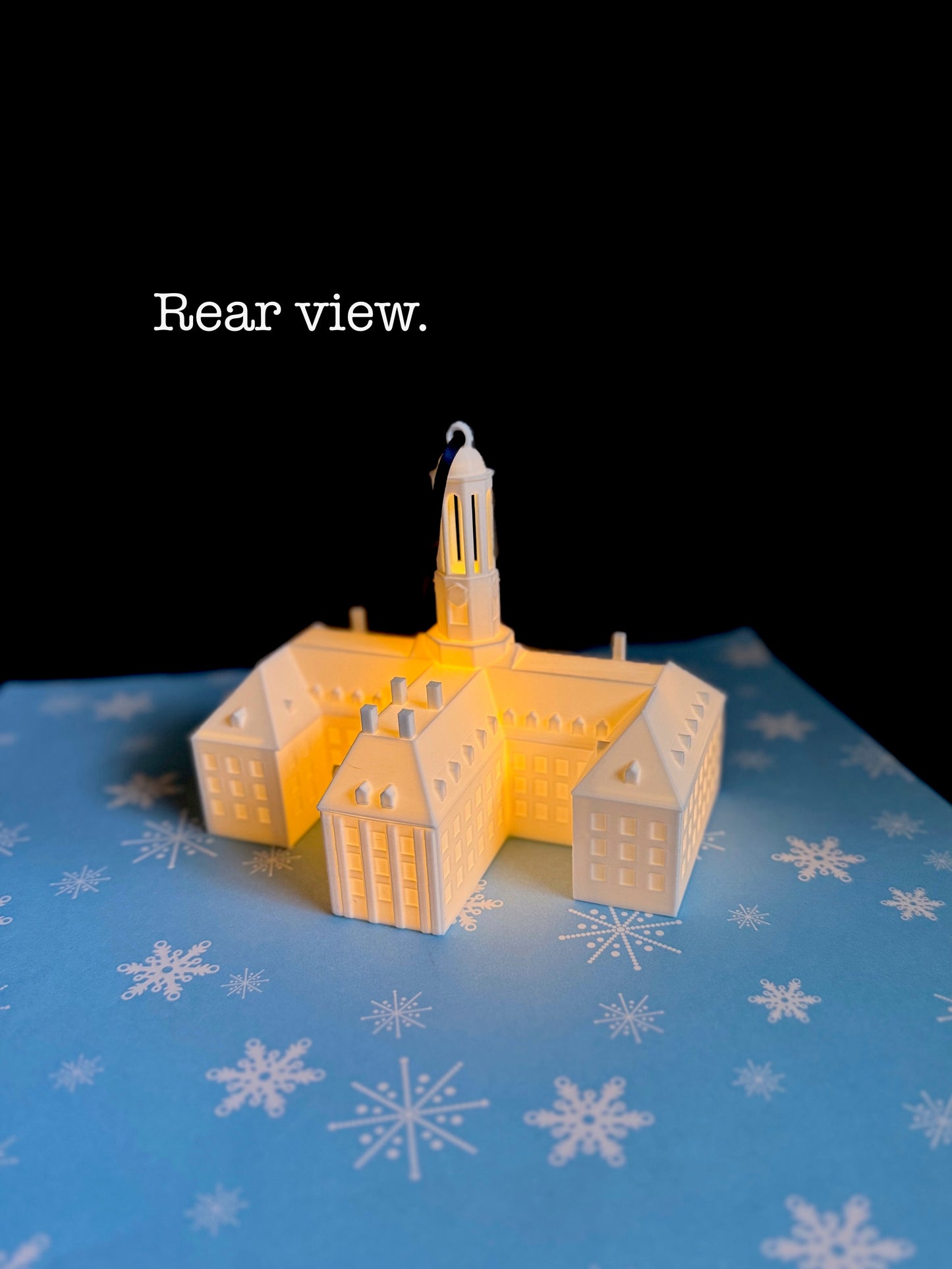 The Penn State Lighted ornament featuring the Old Main building.
