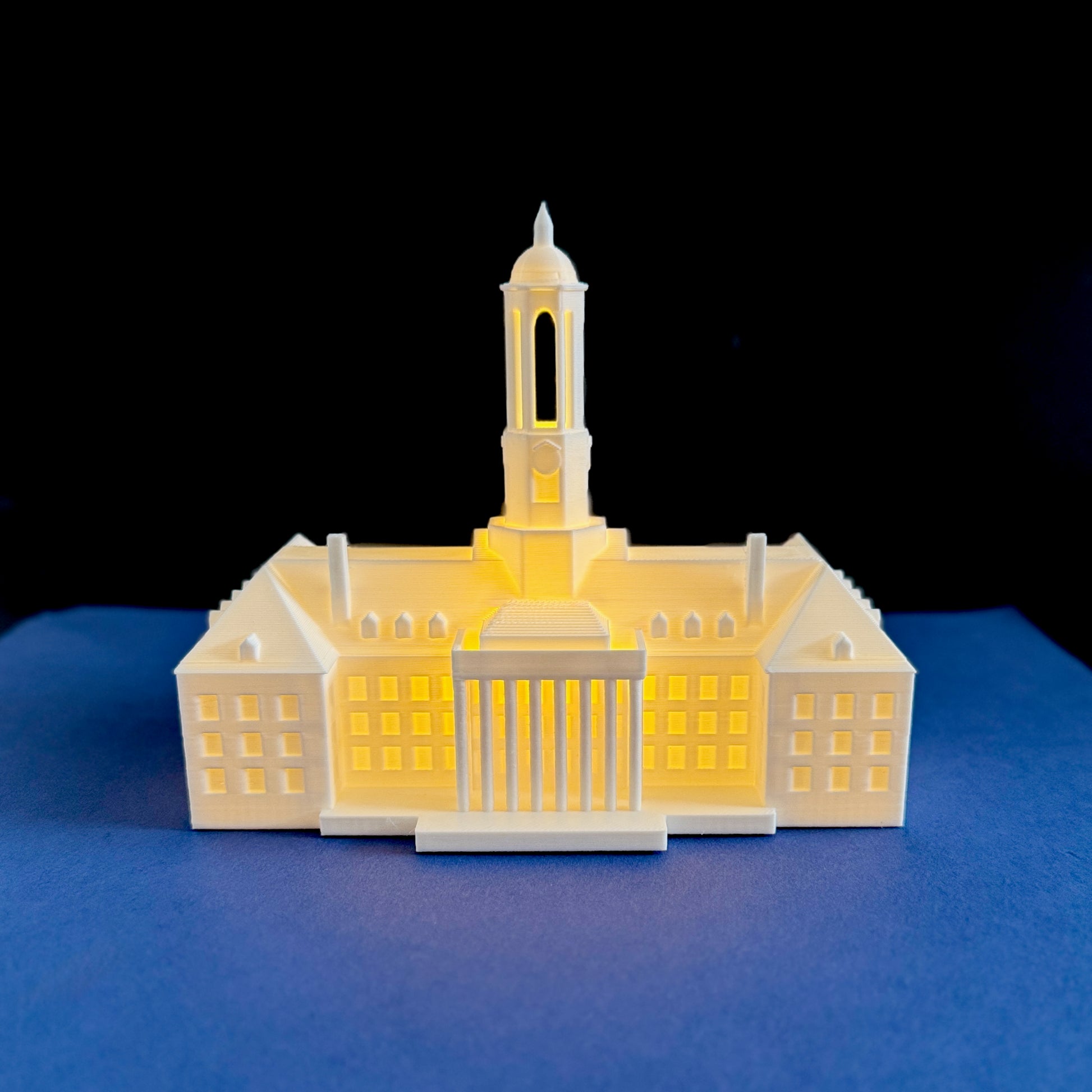 Front view of the Penn State night light, designed to look like the Old Main building
