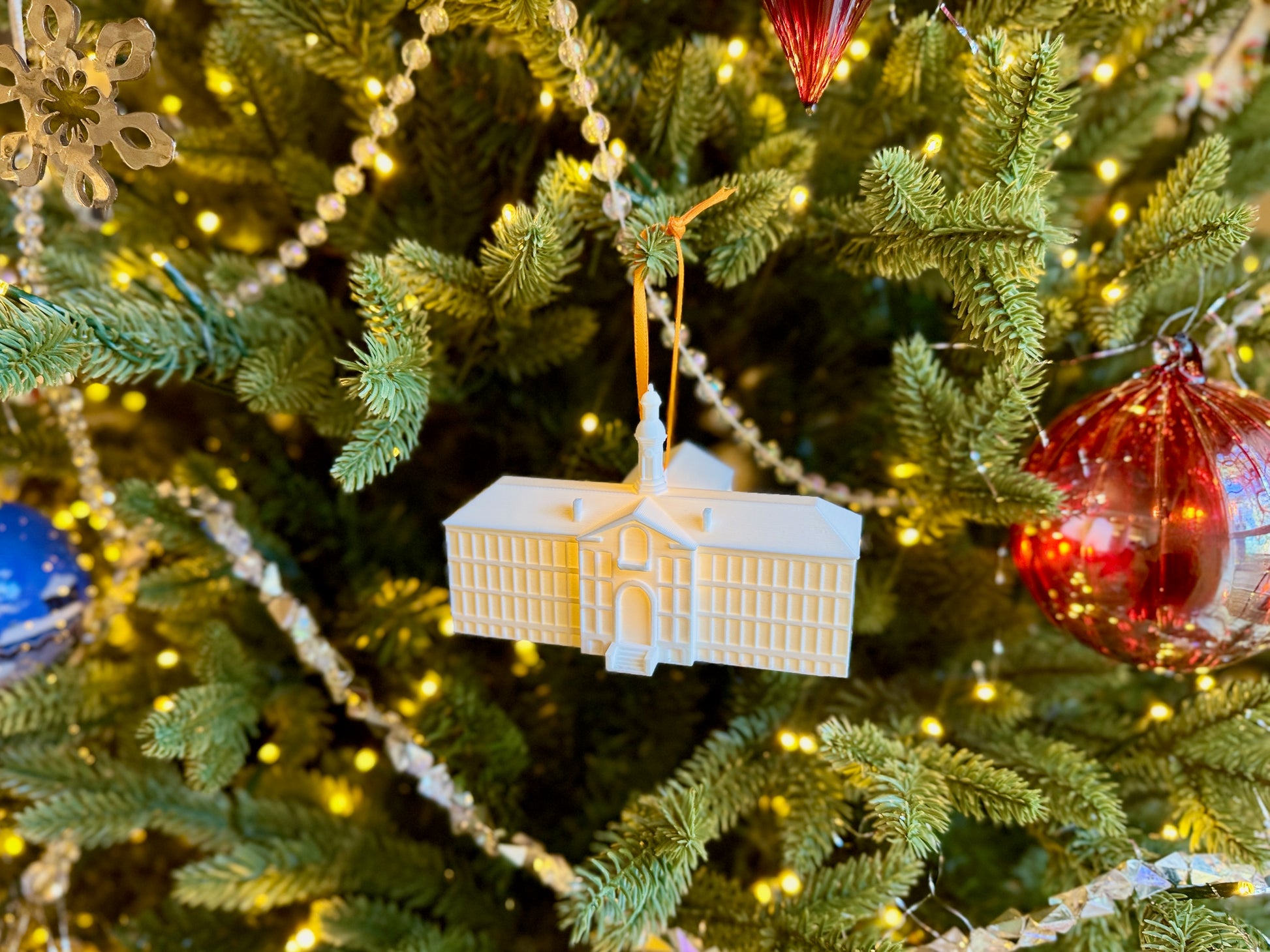 Princeton ornament for alumni shown on a Christmas tree.