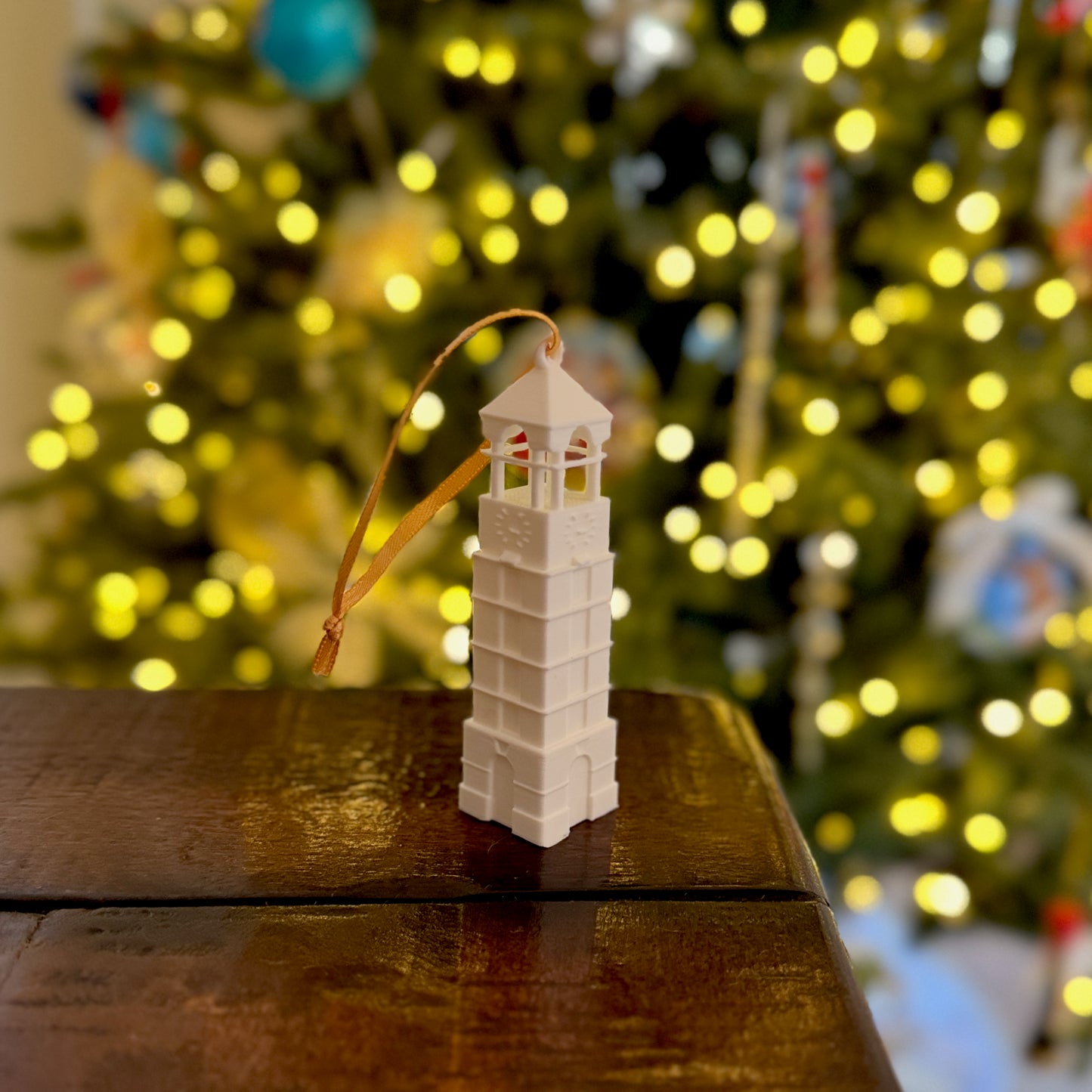 The Purdue ornament, designed in honor of the Bell Tower and shown in a home decorated for the Holidays.