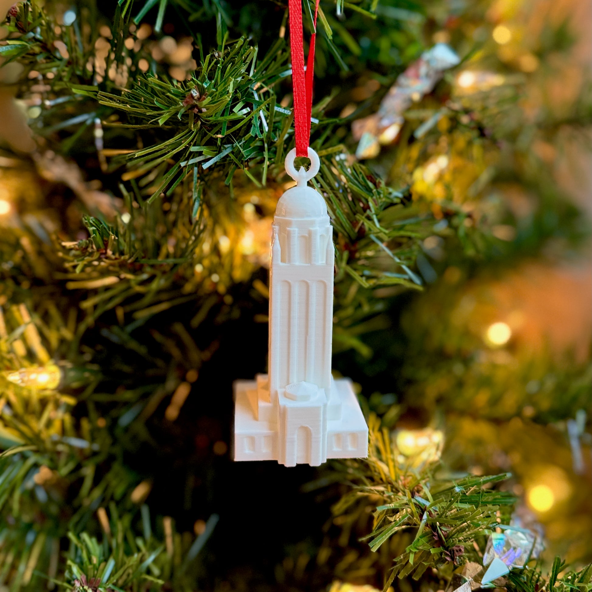 The Stanford University ornament shown on a Christmas tree.